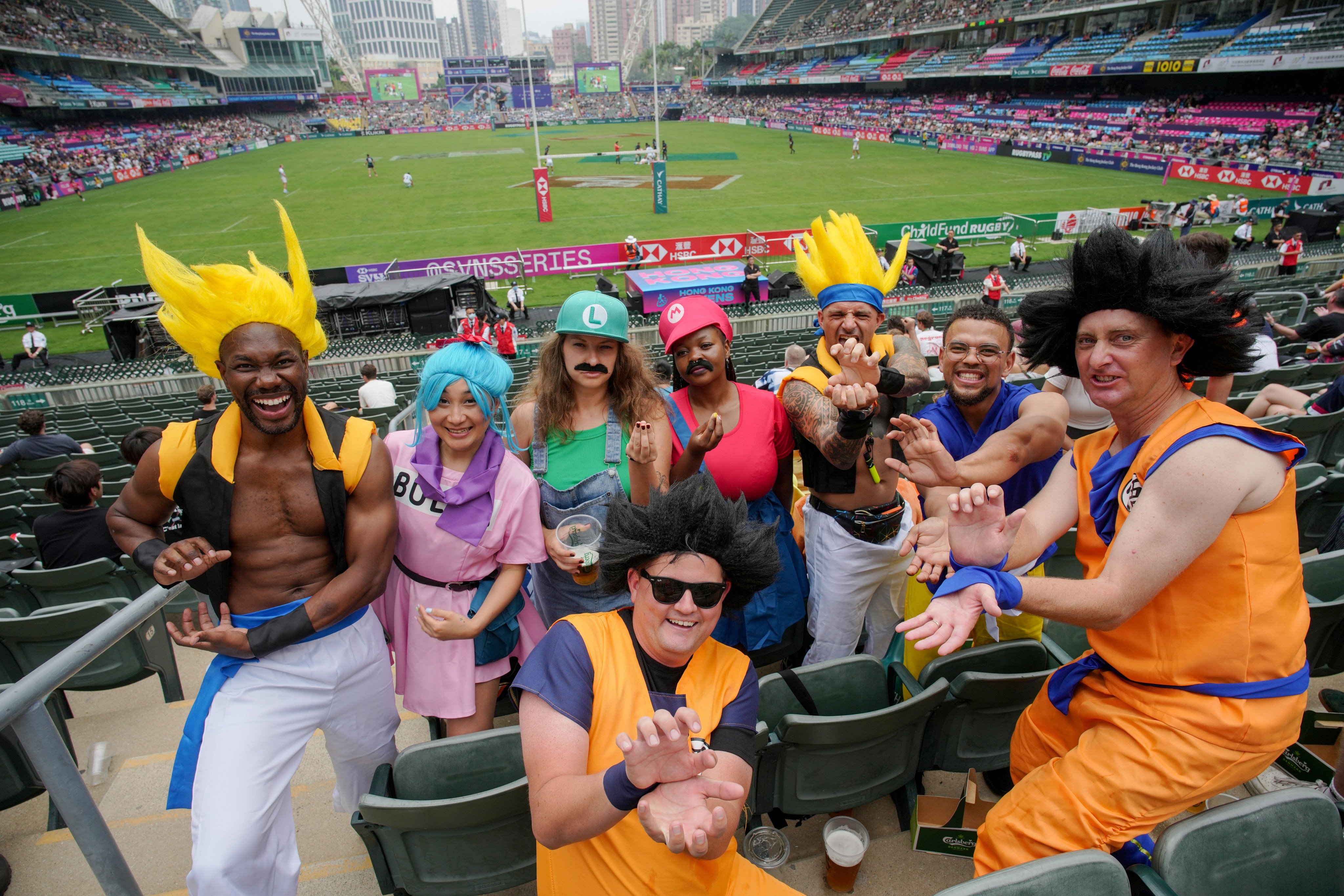 Fans dressing as cartoon characters on the first day of Hong Kong Sevens. Photo: Eugene Lee