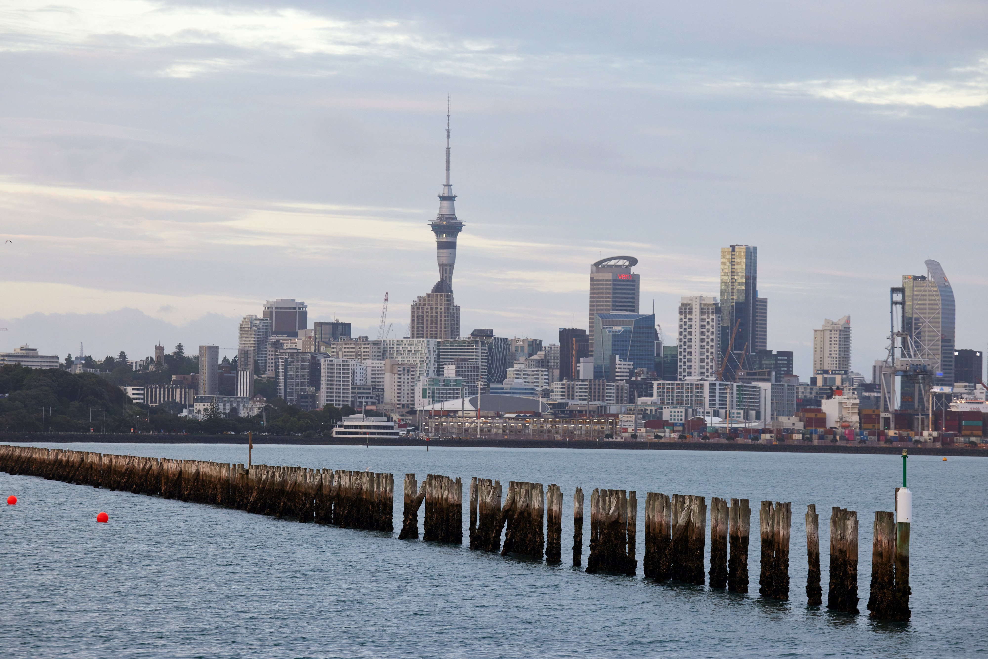 The skyline of Auckland, New Zealand. Minimum skill and work experience criteria, as well as an English-language requirement, will apply to most jobs under changes to the visa programme. Photo: Bloomberg