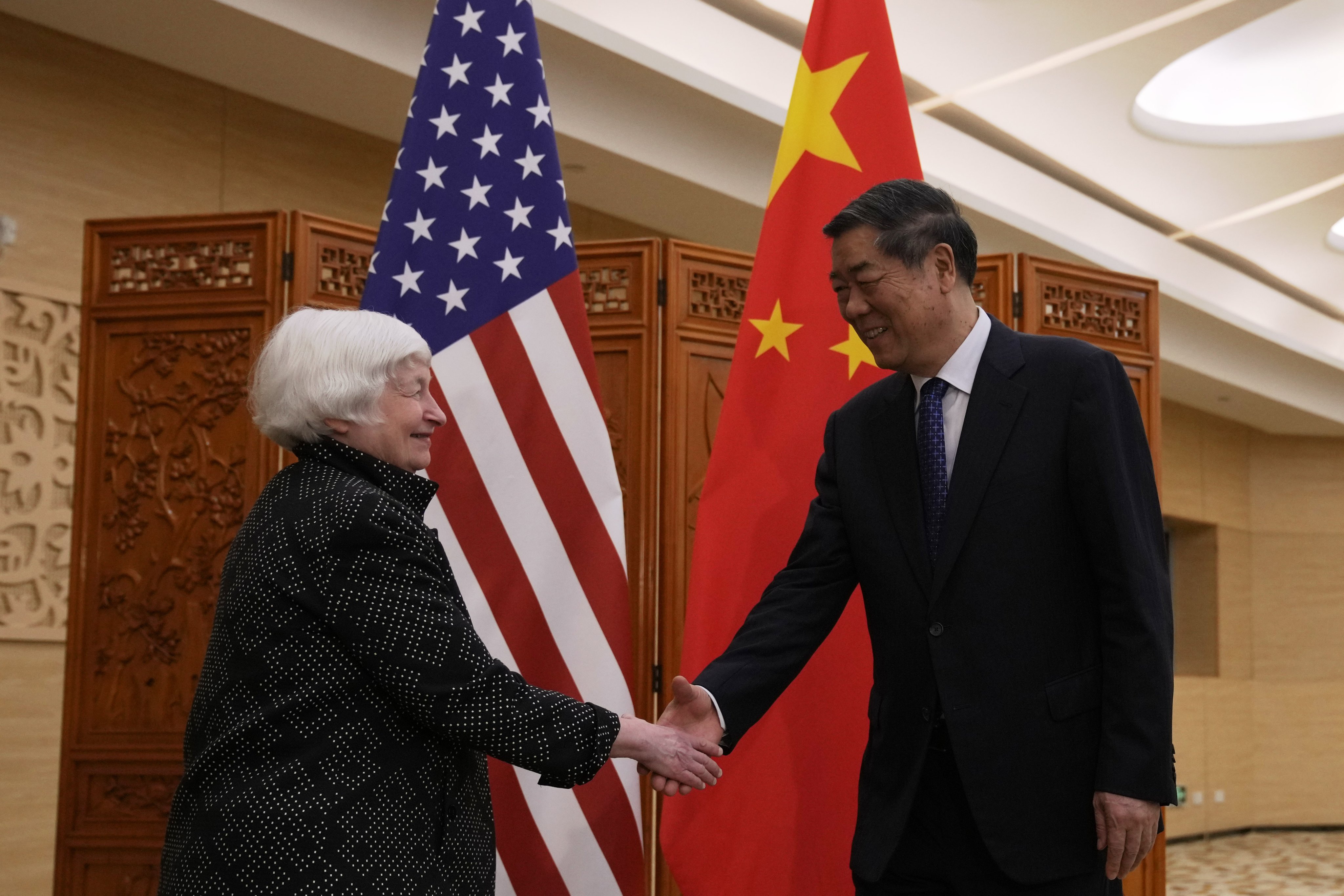 US Treasury Secretary Janet Yellen (L) shakes hands with Chinese Vice Premier He Lifeng (R) during a meeting in Guangdong province, China on April 5, 2024. Photo: EPA-EFE