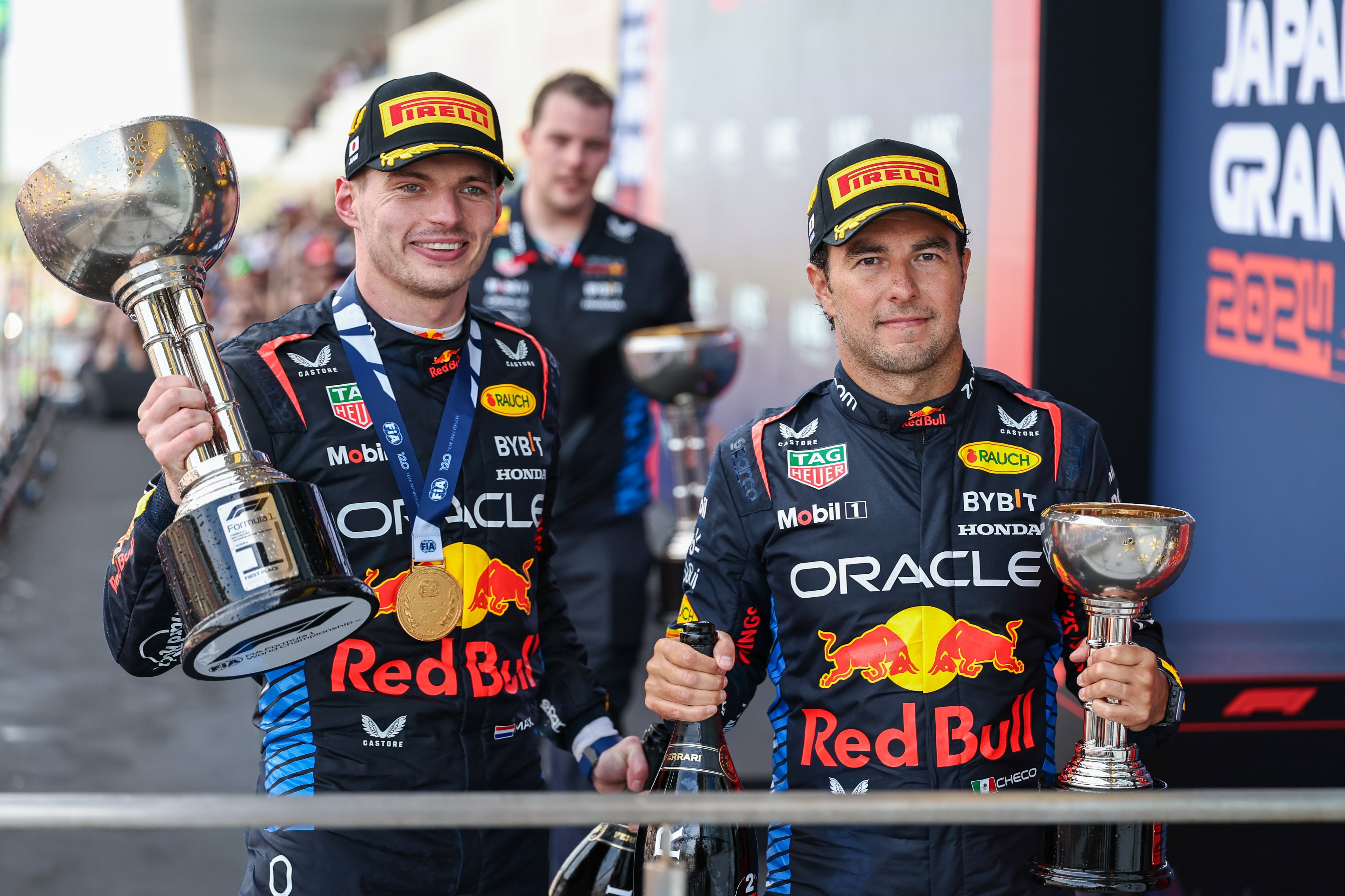 Red Bull’s Max Verstappen (left) with second-placed teammate, Sergio Perez, after the award ceremony for the Japanese Grand Prix at Suzuka on Sunday. Photo: Xinhua