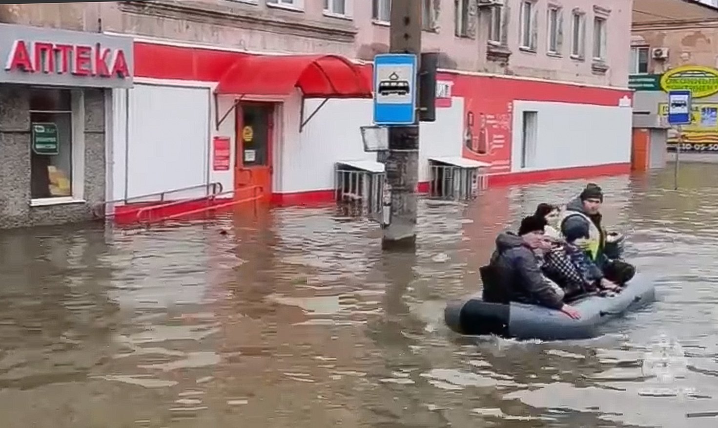 Residents in a boat on a flooded street in Orsk, Russia, on Sunday. A dam failure caused by high water levels in the Ural River has put thousands of people in the flooding zone, according to officials. Photo:  EPA-EFE via Russia Emergency Situations Ministry Press Service 