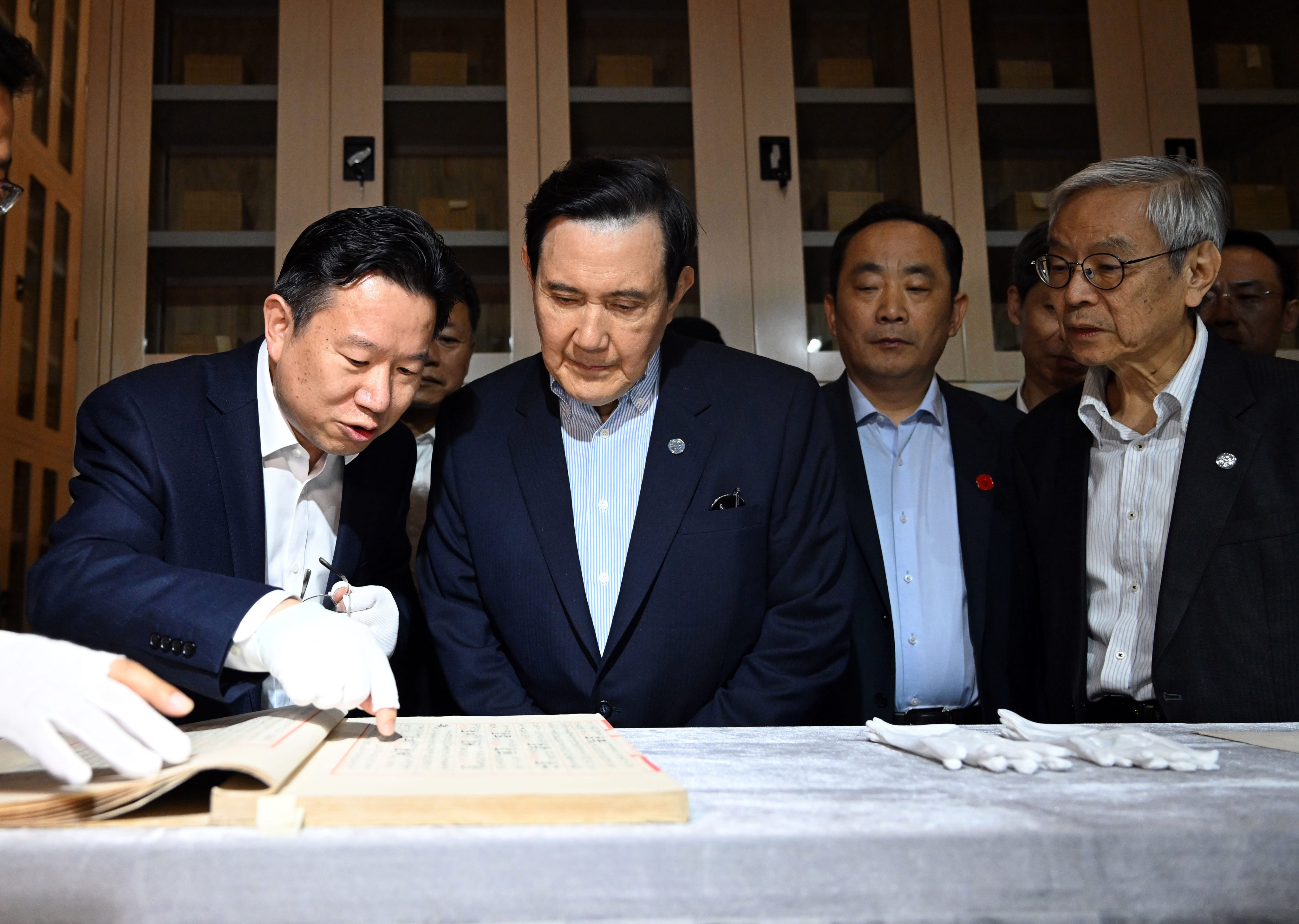 Former Taiwanese president Ma Ying-jeou (centre) visits the Xian branch of the China National Archives of Publications and Culture in the northwest province of Shaanxi on Saturday. Photo: Xinhua