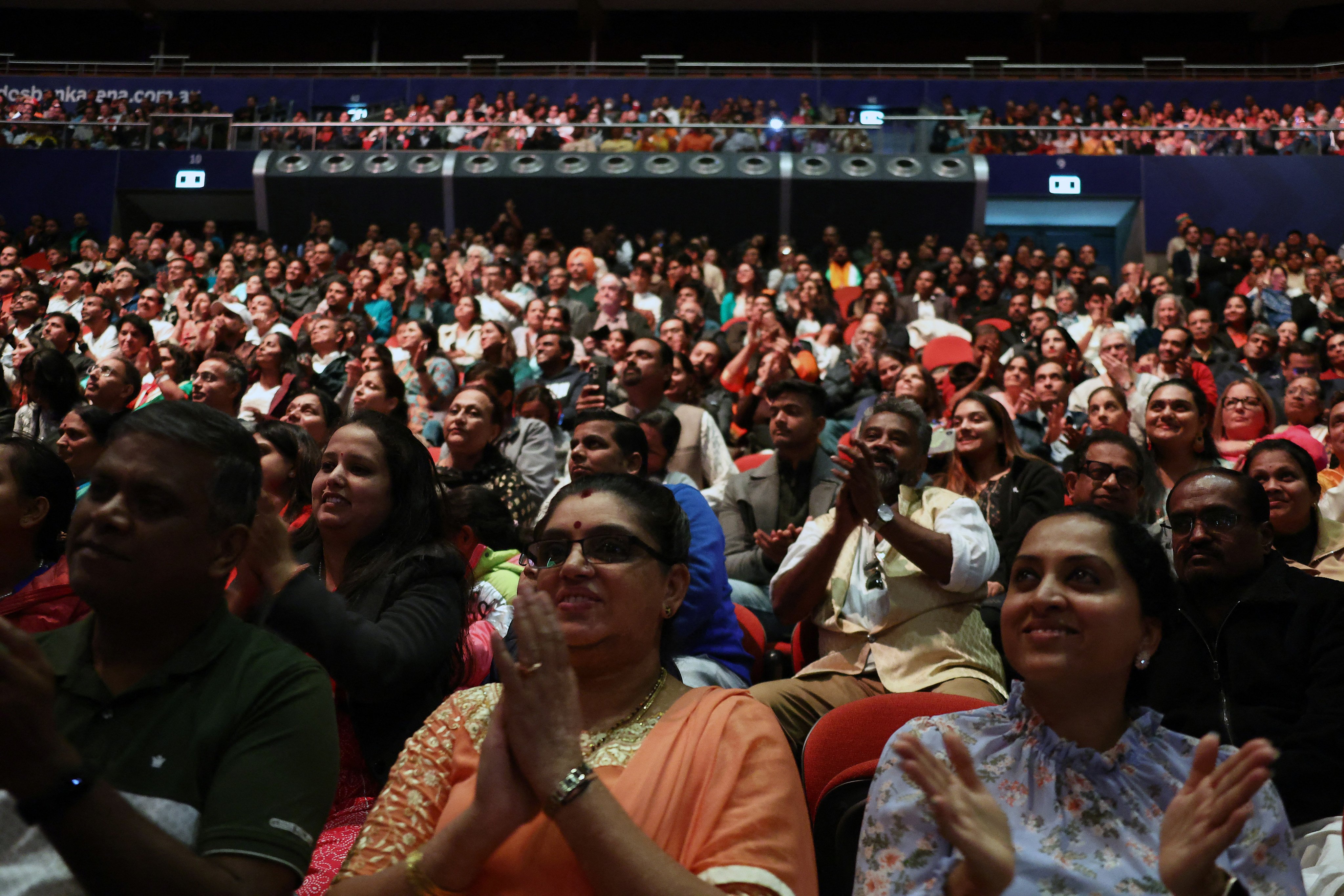 Indian-Australians listen to a speech in Sydney last year by Indian Prime Minister Narendra Modi. A recent survey revealed significant under-representation of the Indian diaspora in Australian politics and leadership roles. Photo: AFP