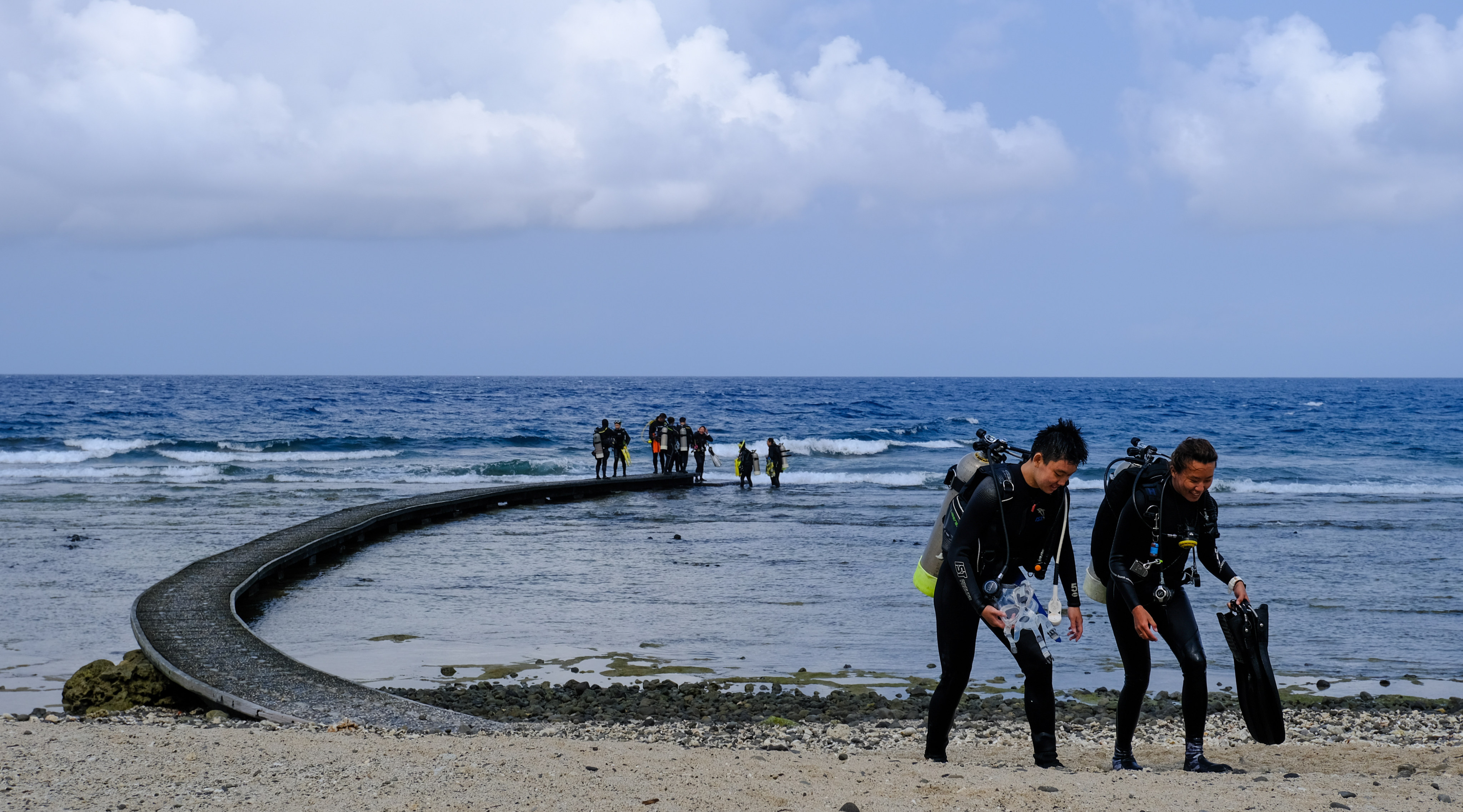 Scuba divers emerge from the waters of Taiwan’s southern Green Island. It and another southern island, Liuqiu, are less touristy and offer easily accessible snorkelling and diving among corals, and a laid-back atmosphere. Photo: Pete Ford