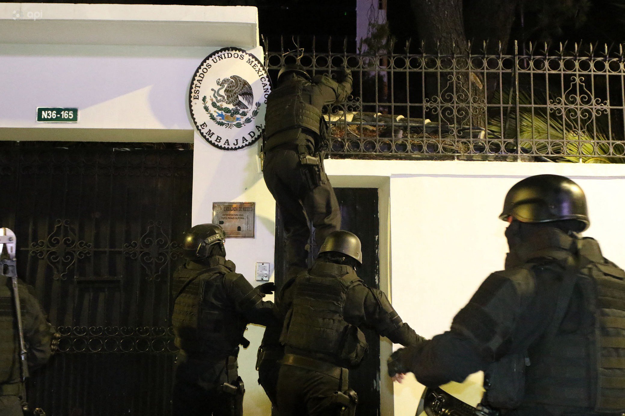 Ecuadorian police special forces enter the Mexican embassy in Quito on Friday. Photo: AFP