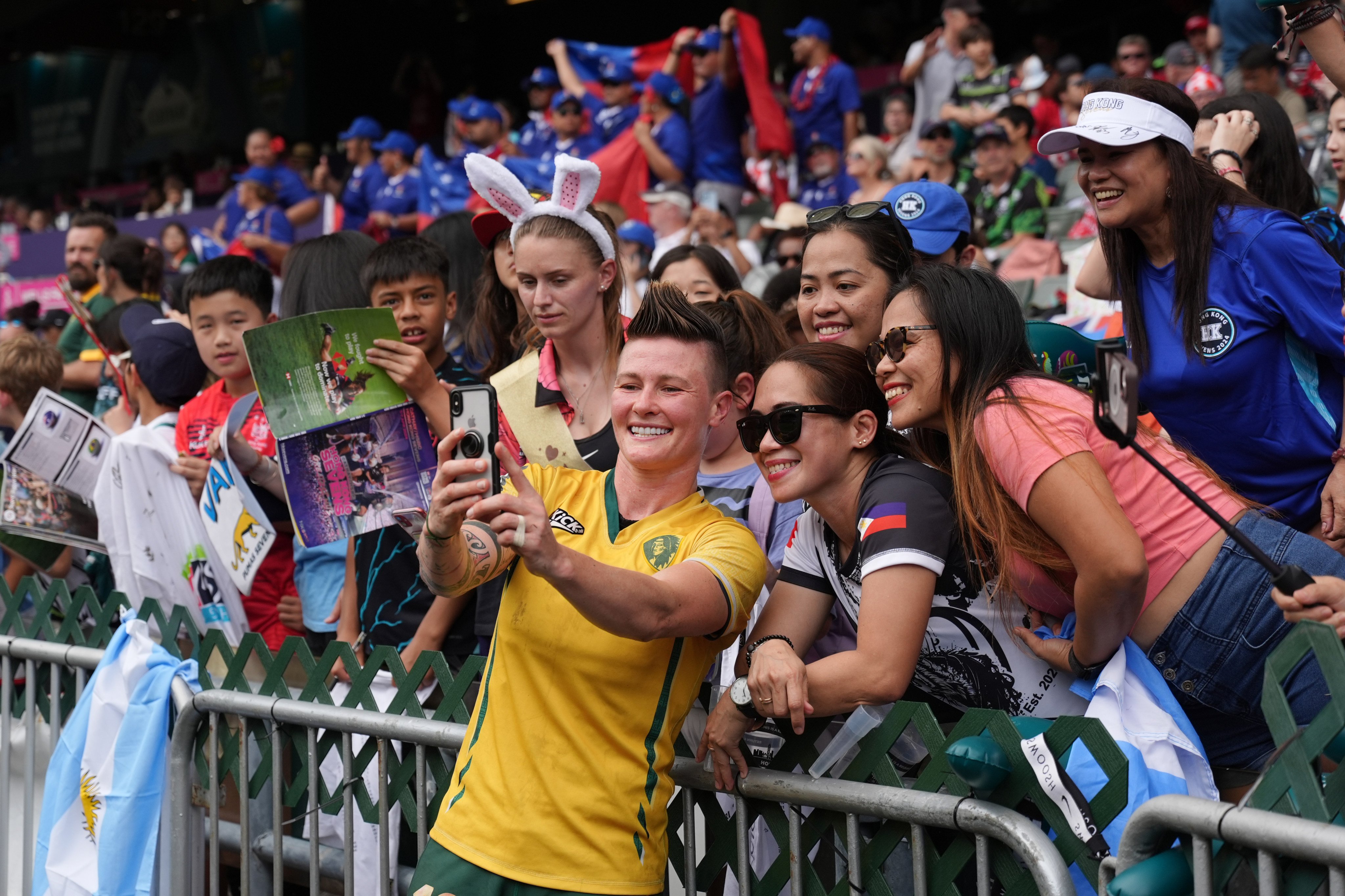 Brazil’s Raquel Kochhann takes a selfie with fans after her side’s game against Great Britain at the Cathay/HSBC Hong Kong Sevens. Photo: Eugene Lee