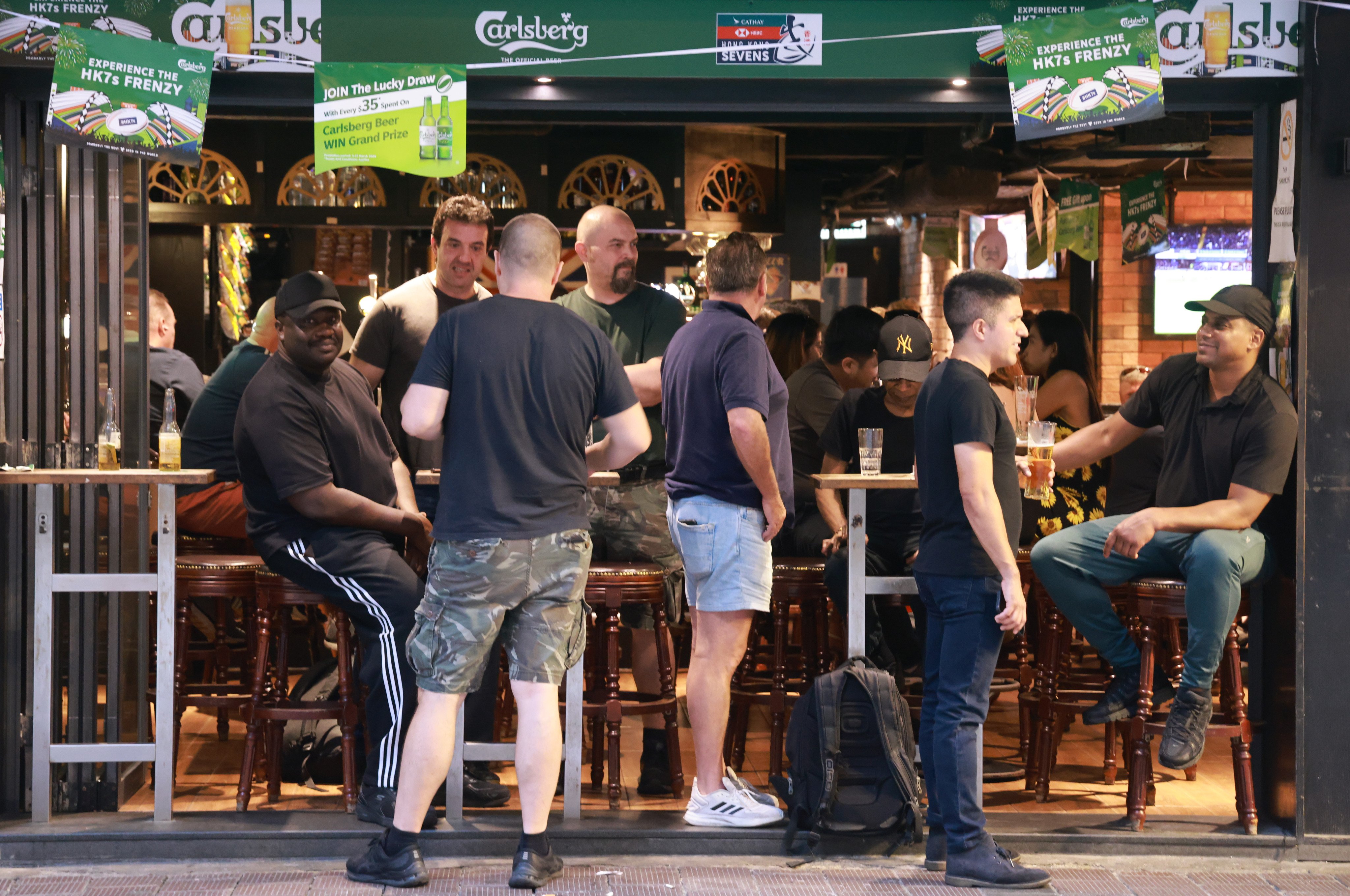 Rugby fans in Hong Kong’s Wan Chai neighbourhood on the eve of the 2024 Rugby Sevens. After a grim Easter the week before, the sporting event provided relief for bars and restaurants, and highlighted why the city’s tourism strategy must change. Photo: May Tse