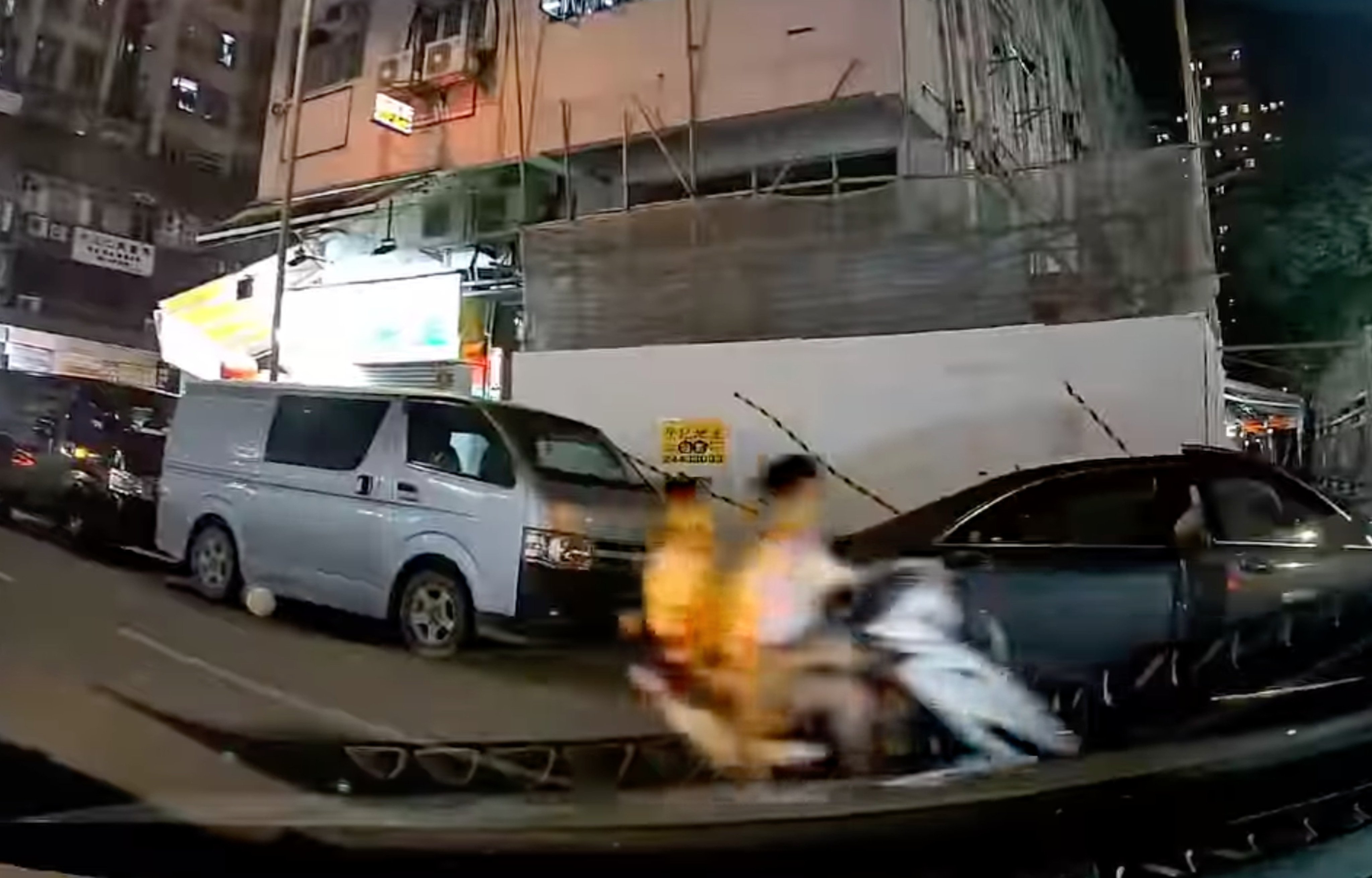 The videos show two teenagers riding a motorbike as they swerve between the road and pavement. Photo: Facebook/Eric So