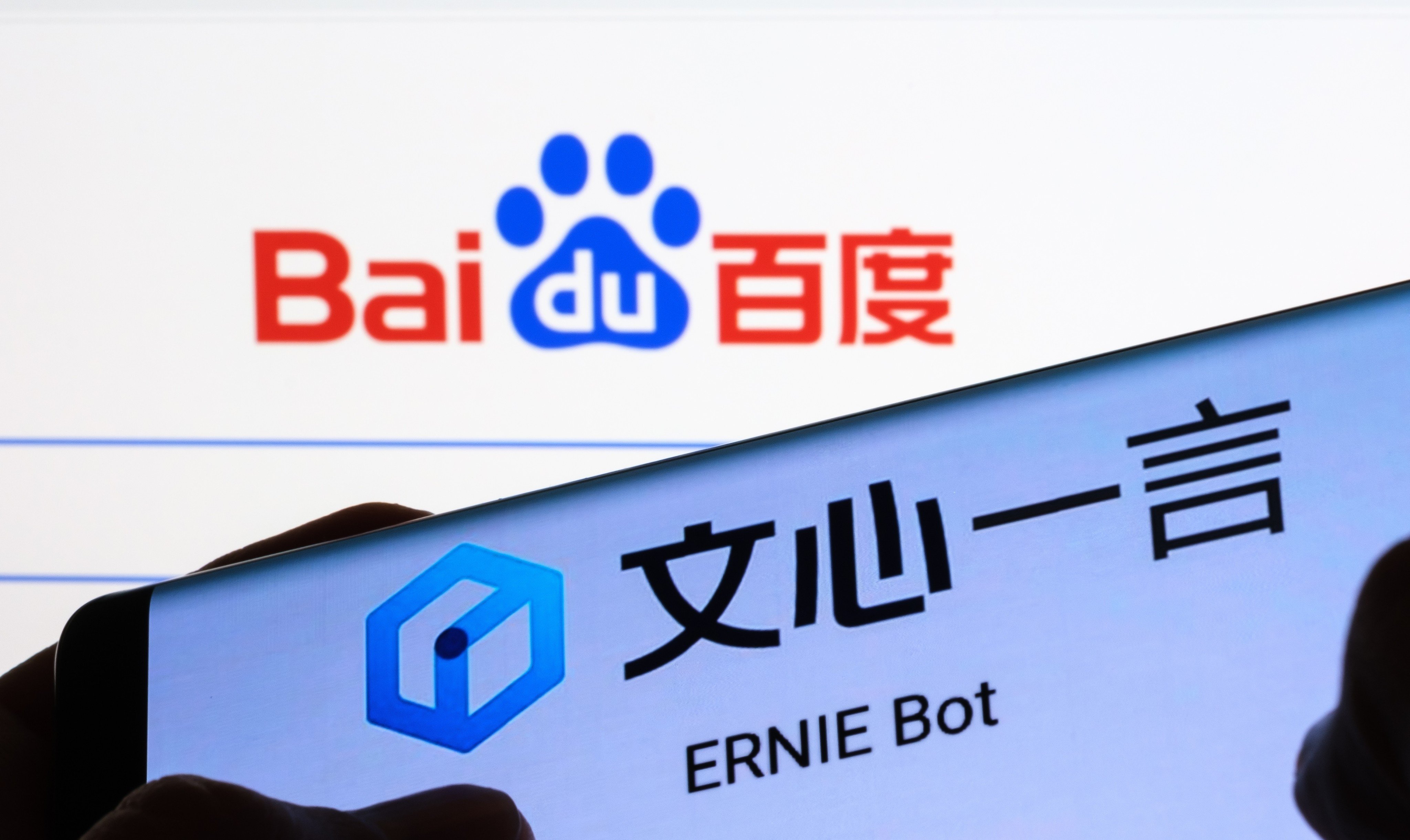 The Ernie Bot logo is seen on a smartphone screen with Baidu’s logo in the background. Photo: Shutterstock