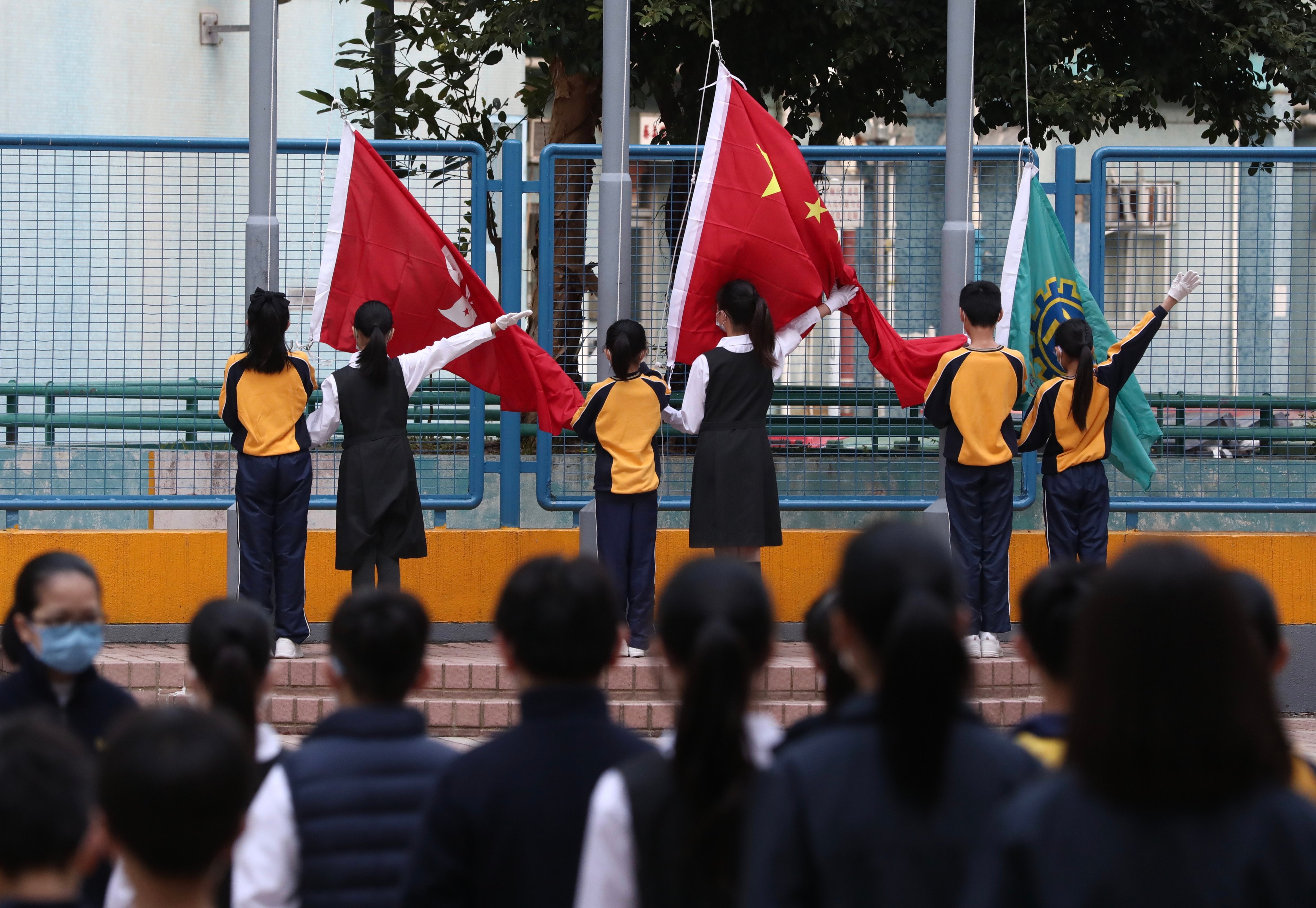 A flag-raising ceremony at a Kwai Fong school. The city’s leader has said he will be focusing on quality of patriotic education and not just quantity. Photo: Jonathan Wong
