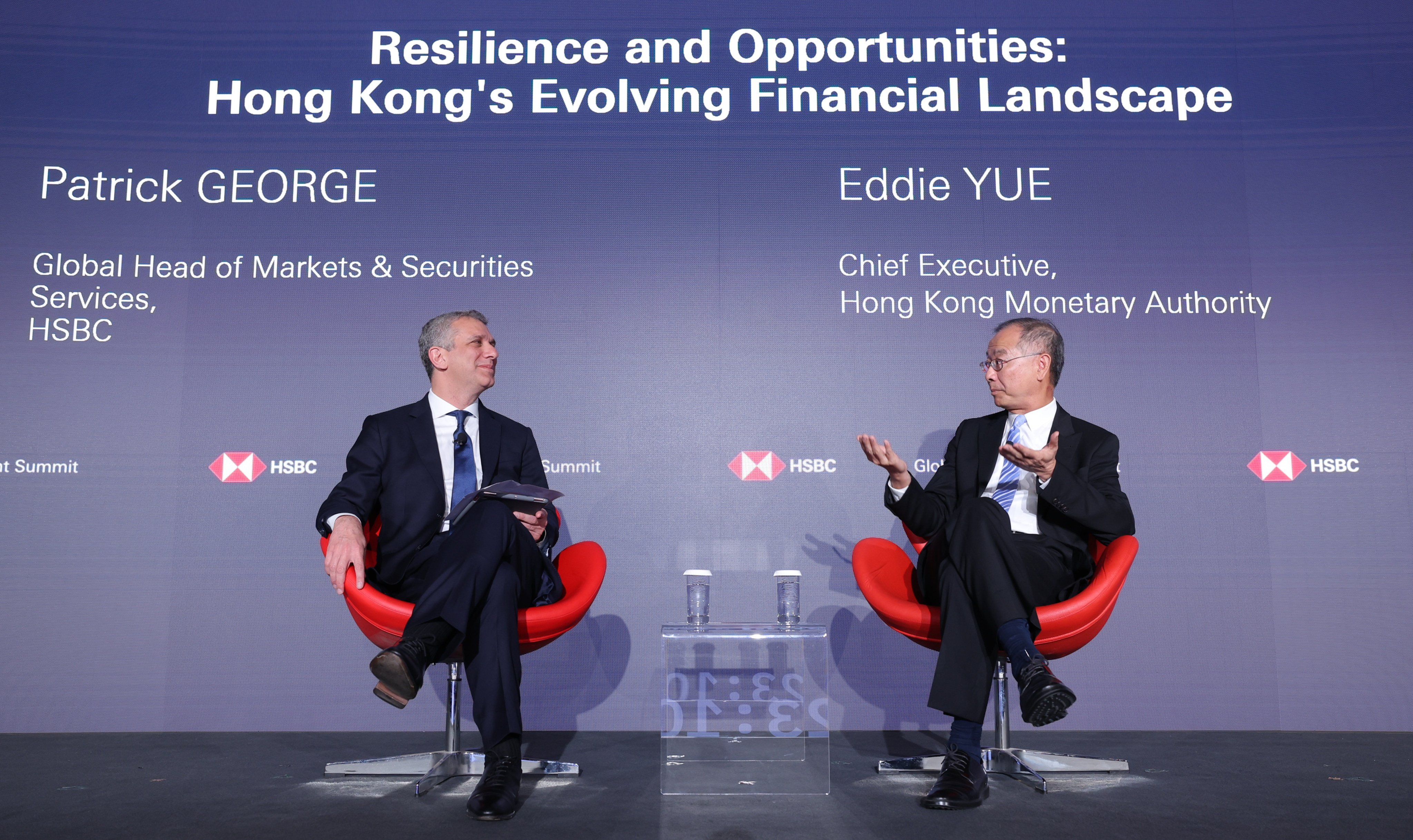 Patrick George, HSBC’s global head of markets and securities services, and Eddie Yue during the summit on Tuesday. Photo: Handout