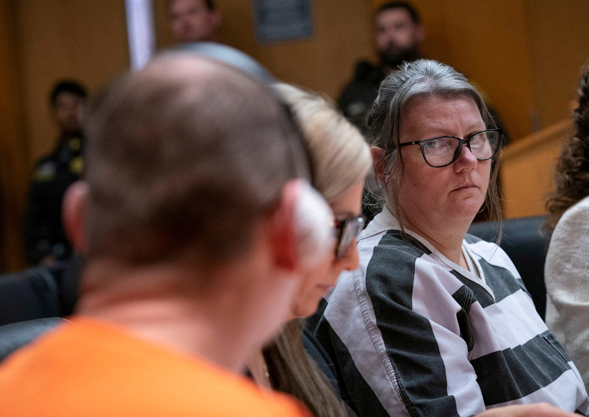 Jennifer Crumbley glances at her husband James Crumbley during their sentencing hearing. Photo: Reuters