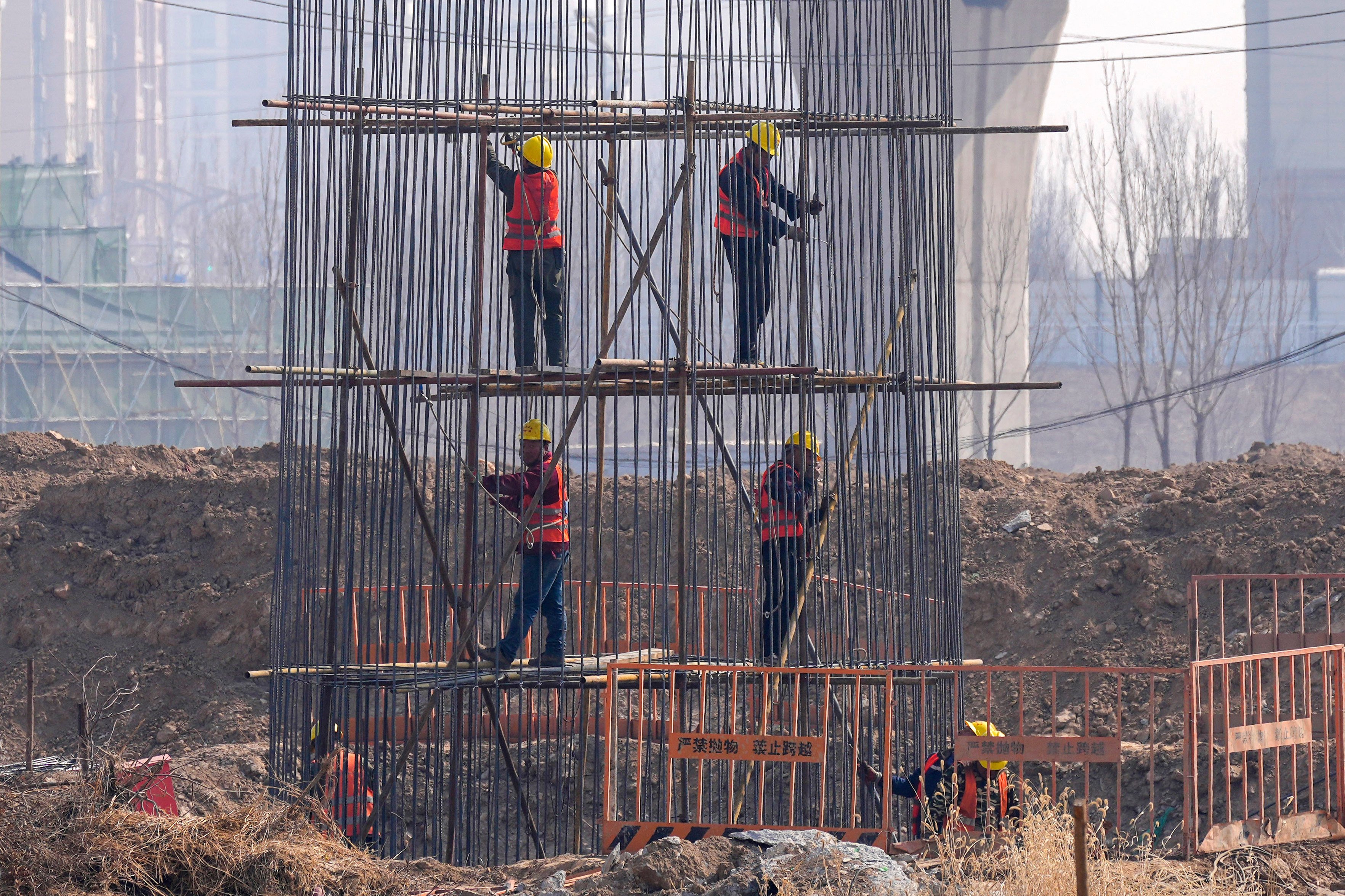 Fitch Ratings made the move due to concerns over China’s property and public finance stress. Photo: AP