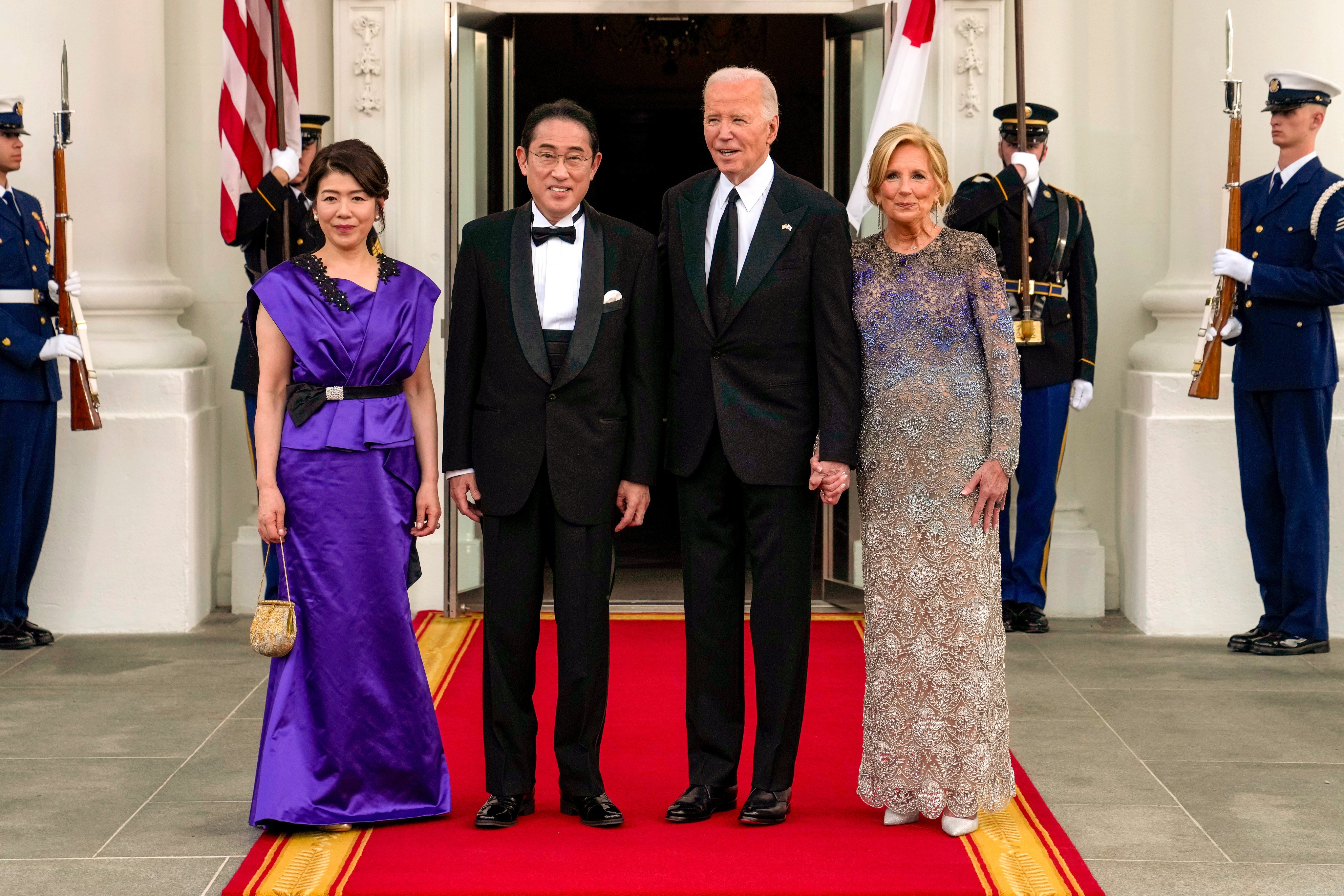 US President Joe Biden and first lady Jill Biden welcome Japanese Prime Minister Fumio Kishida and his wife Yuko Kishida for a state dinner at the White House on Wednesday. Photo: AP