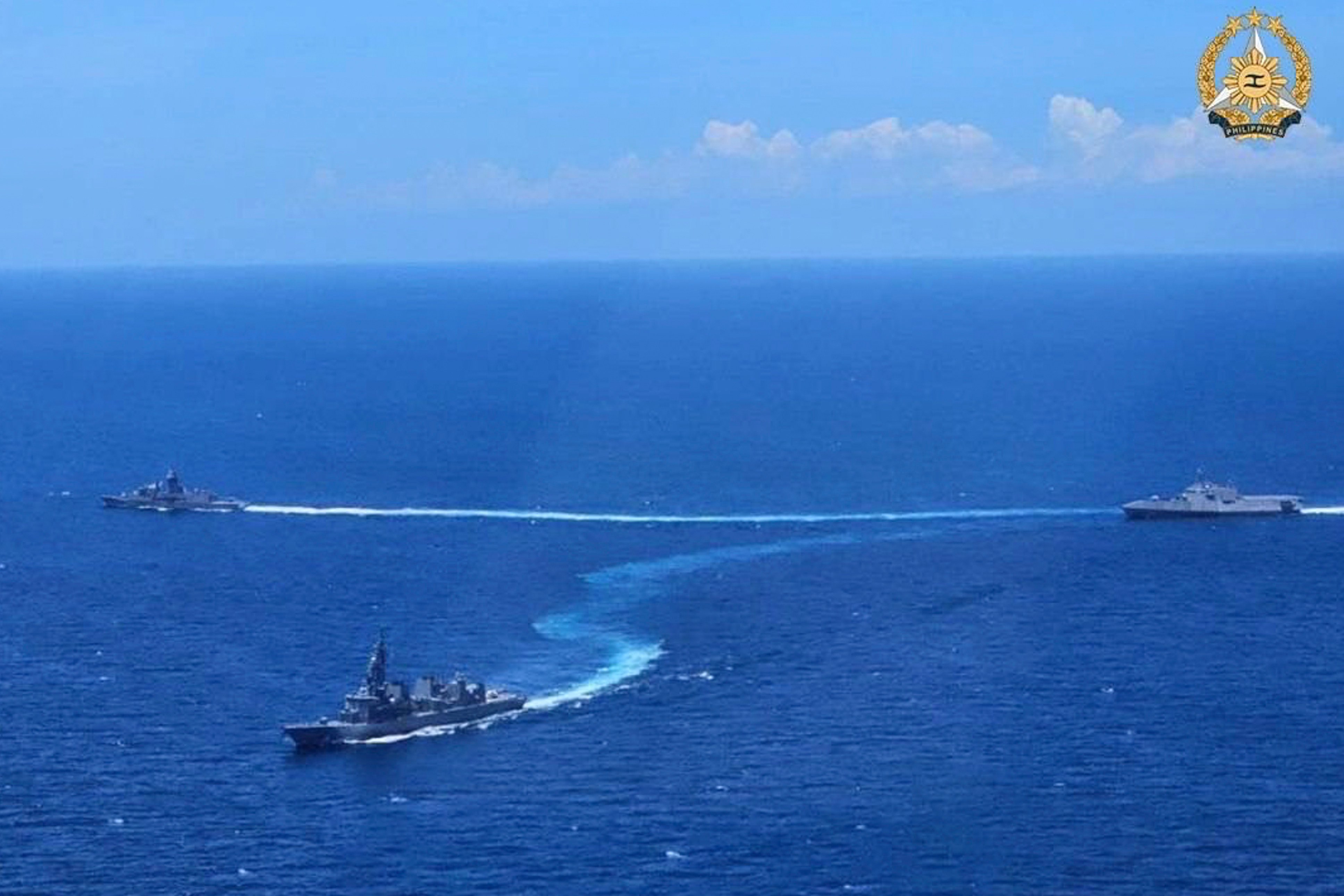 Navy ships from the US, Japan and Australia take part in the first multilateral maritime cooperative activity at the disputed South China Sea on April 7. Photo: Armed Forces of the Philippines via AP
