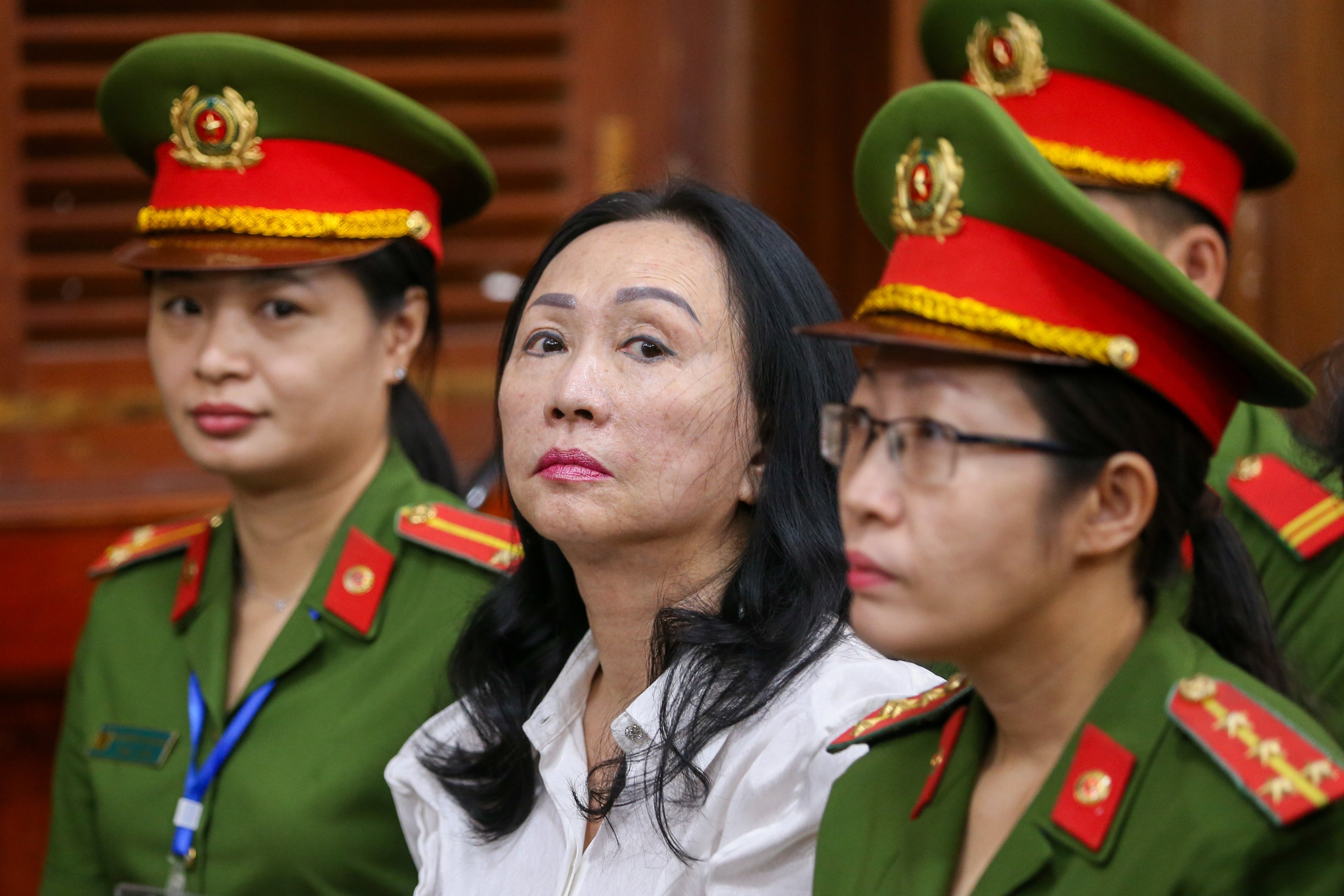 Truong My Lan (centre), chairwoman of Van Thinh Phat Holdings, sits during her trial at the Ho Chi Minh City People’s Court in Ho Chi Minh City, Vietnam, on Thursday. Photo: EPA-EFE