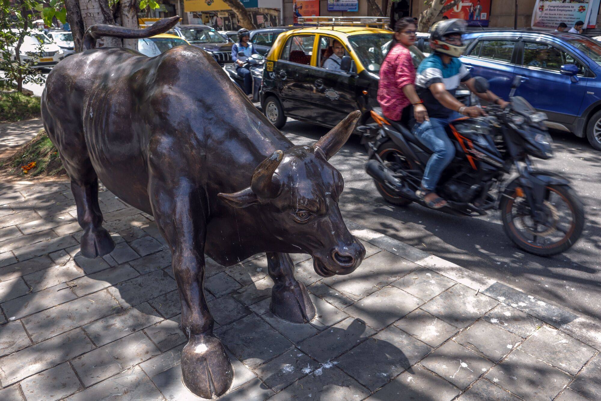 A bronze bull statue outside the Bombay Stock Exchange building in Mumbai on March 15. Although Indian stocks have  delivered eight years of gains, a trading frenzy among inexperienced retail investors has led to regulatory clampdowns. The actions have had a chilling effect on India’s once-booming market for initial public offerings and caused a brutal sell-off in smaller stocks. Photo: Bloomberg 