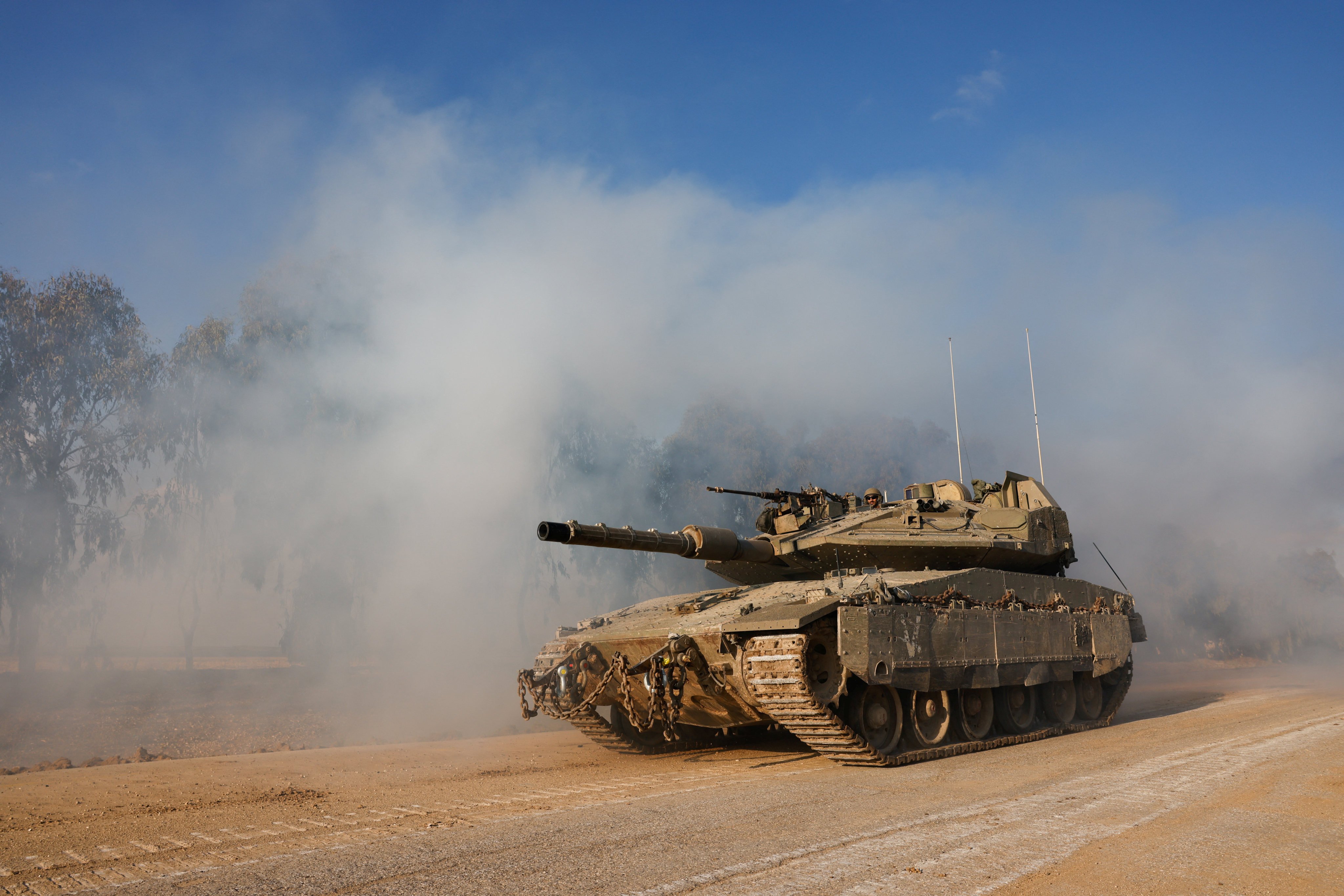 An Israeli tank manoeuvres near the Israel-Gaza border on Wednesday amid the ongoing conflict. Photo: Reuters
