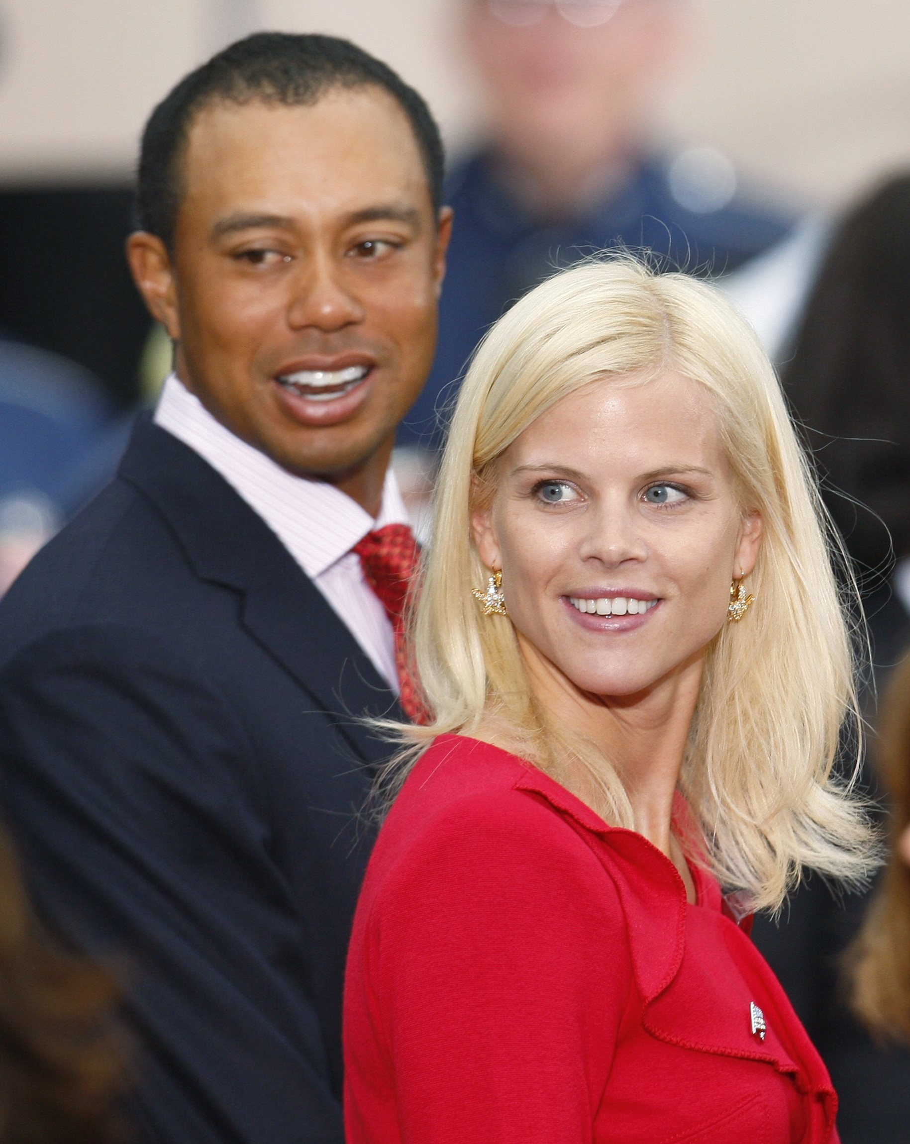 Golfer Tiger Woods departs closing ceremonies with his wife Elin Nordegren at the Presidents Cup golf tournament in San Francisco, California, in 2009. Photo: Reuters