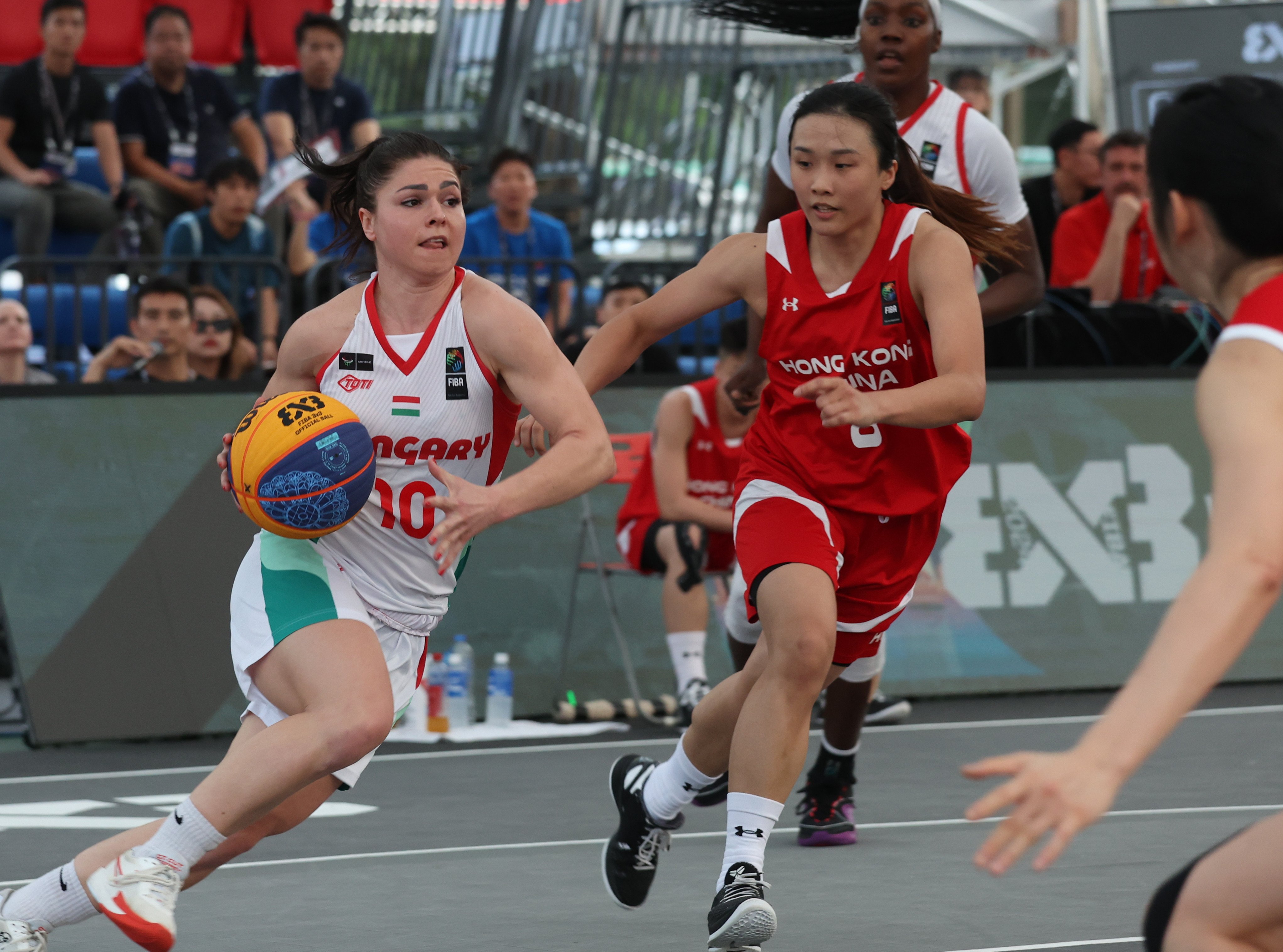 Hungary’s Klaudia Pappu (left) takes on Hong Kong during the 3x3 Olympic qualifying event. Photo: Yik Yeung-man