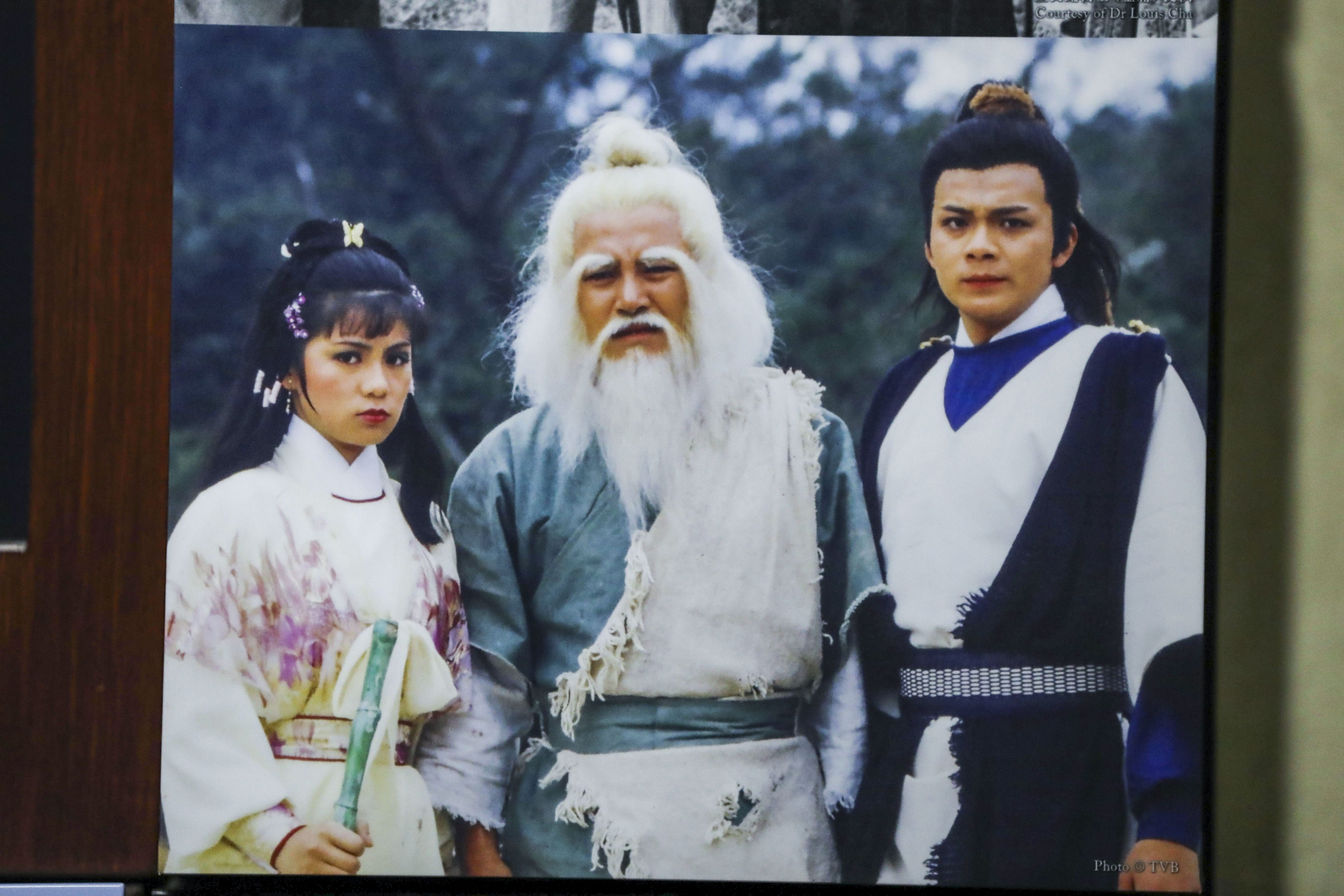 A picture of Barbara Yung, Lau Dan and Felix Wong, in character as Huang Rong, Hong Qigong and Guo Jing in TVB’s The Legend of the Condor Heroes, is shown at the Jin Yong Gallery at the Hong Kong Heritage Museum in Sha Tin in 2018. Photo: Nora Tam 