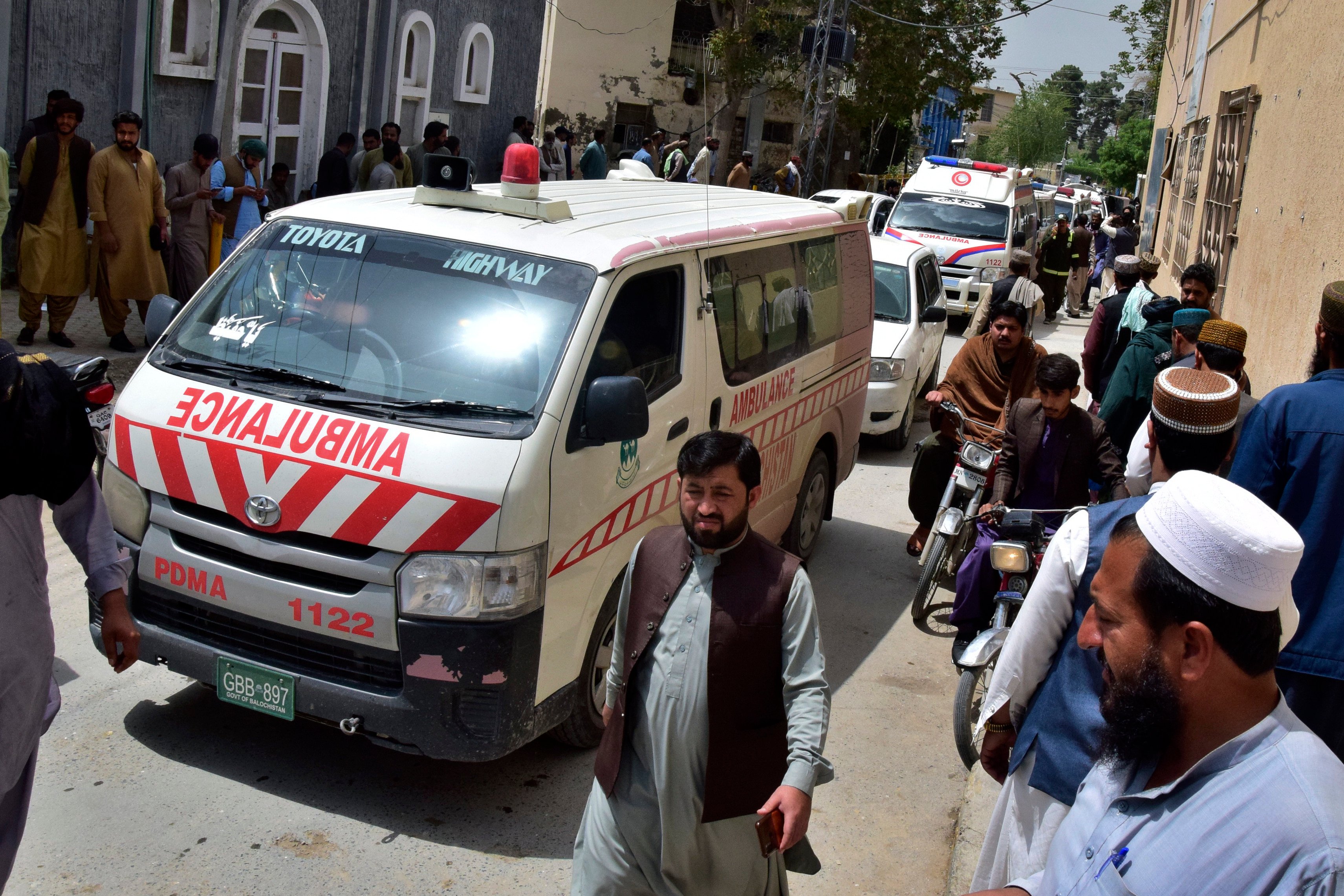 An ambulance carrying the bodies of people killed by gunmen arrives at a hospital in Quetta, Pakistan, on Saturday. Photo: AP