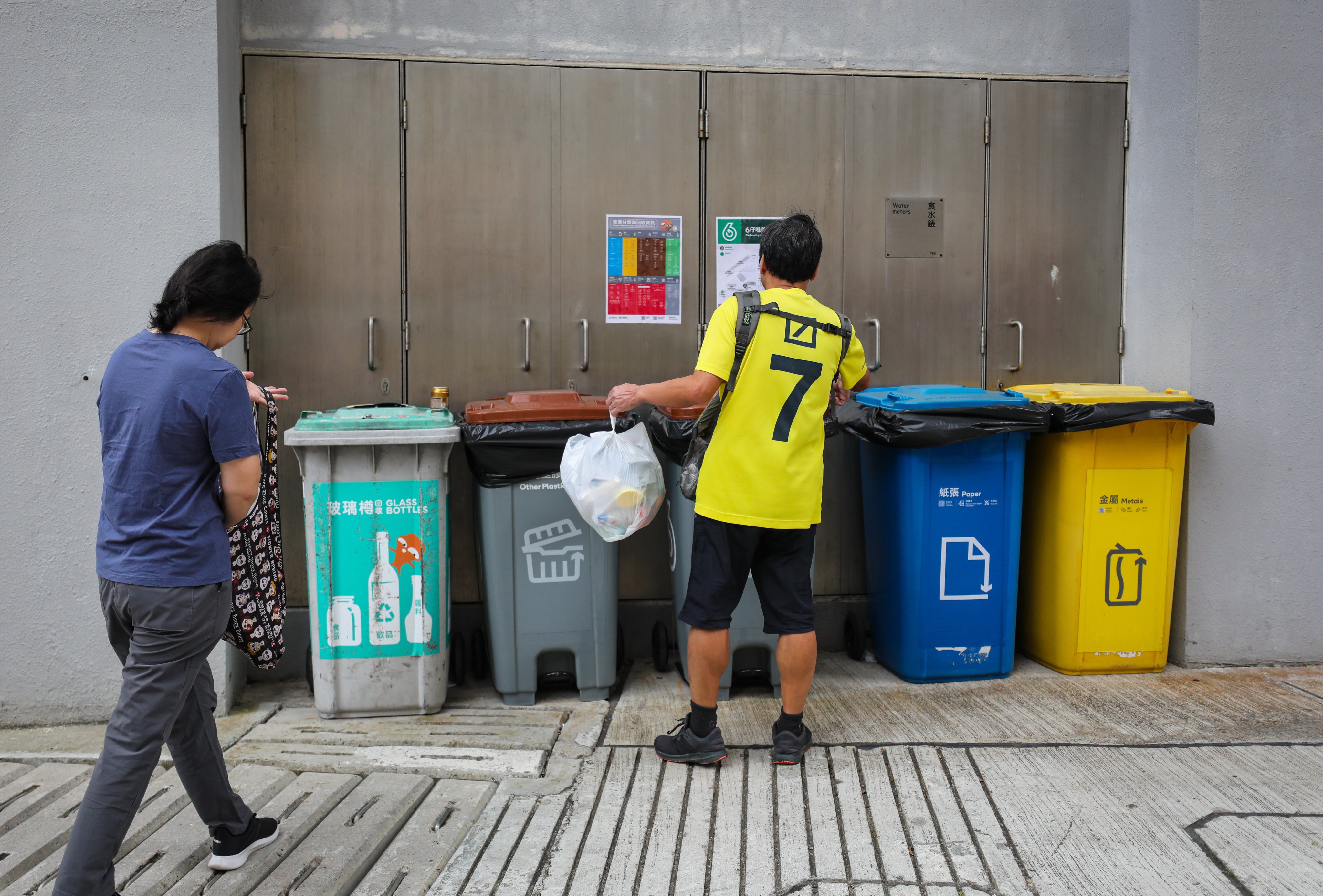 Residents bring their recycling at Lin Tsui Estate in Chai Wan, one of the 14 locations under the waste charging scheme trial. Photo: Xiaomei Chen