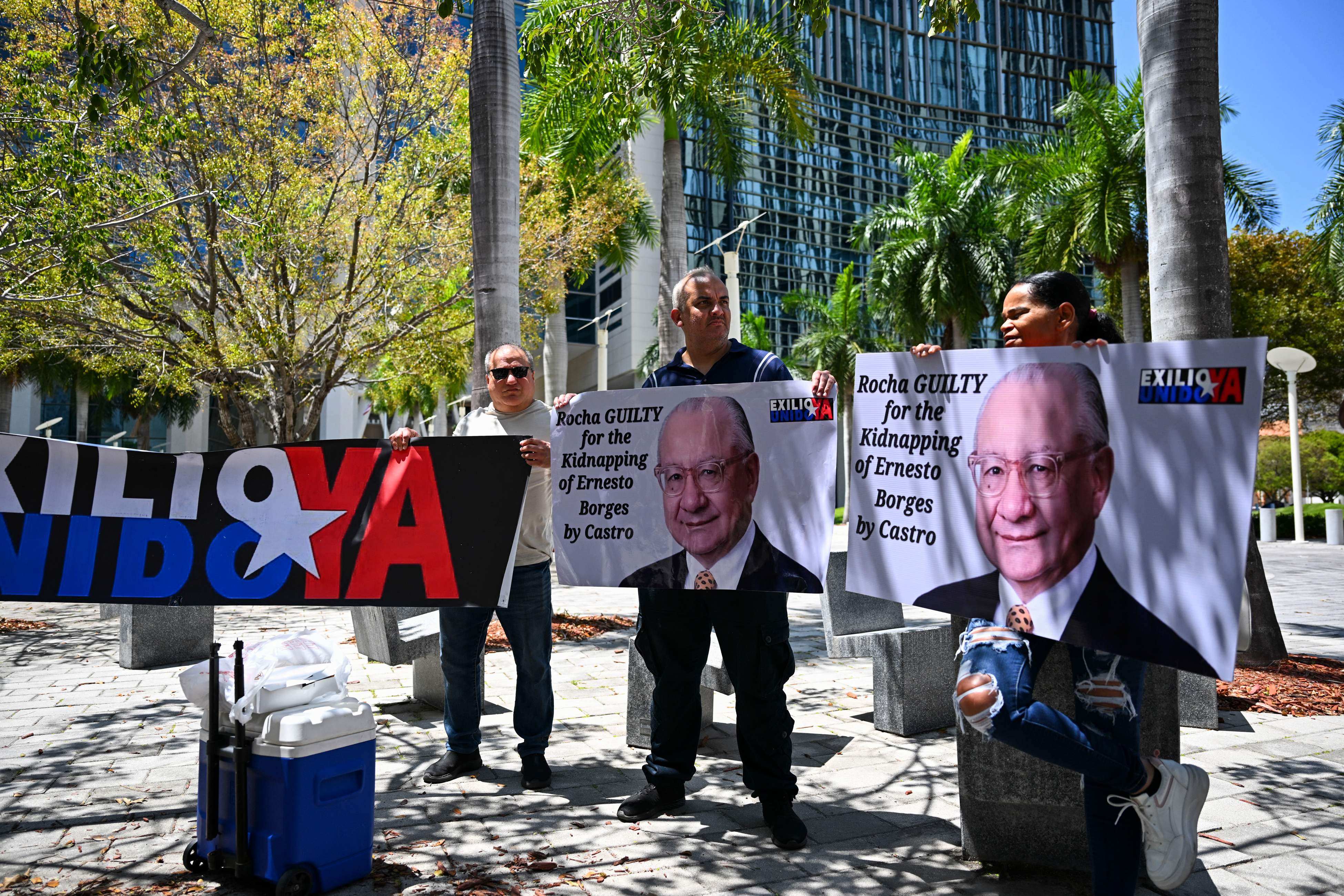 People protest demanding the “maximum sentence” for former US diplomat Victor Manuel Rocha outside a courthouse in Miami, Florida, on April 12. Photo: AFP