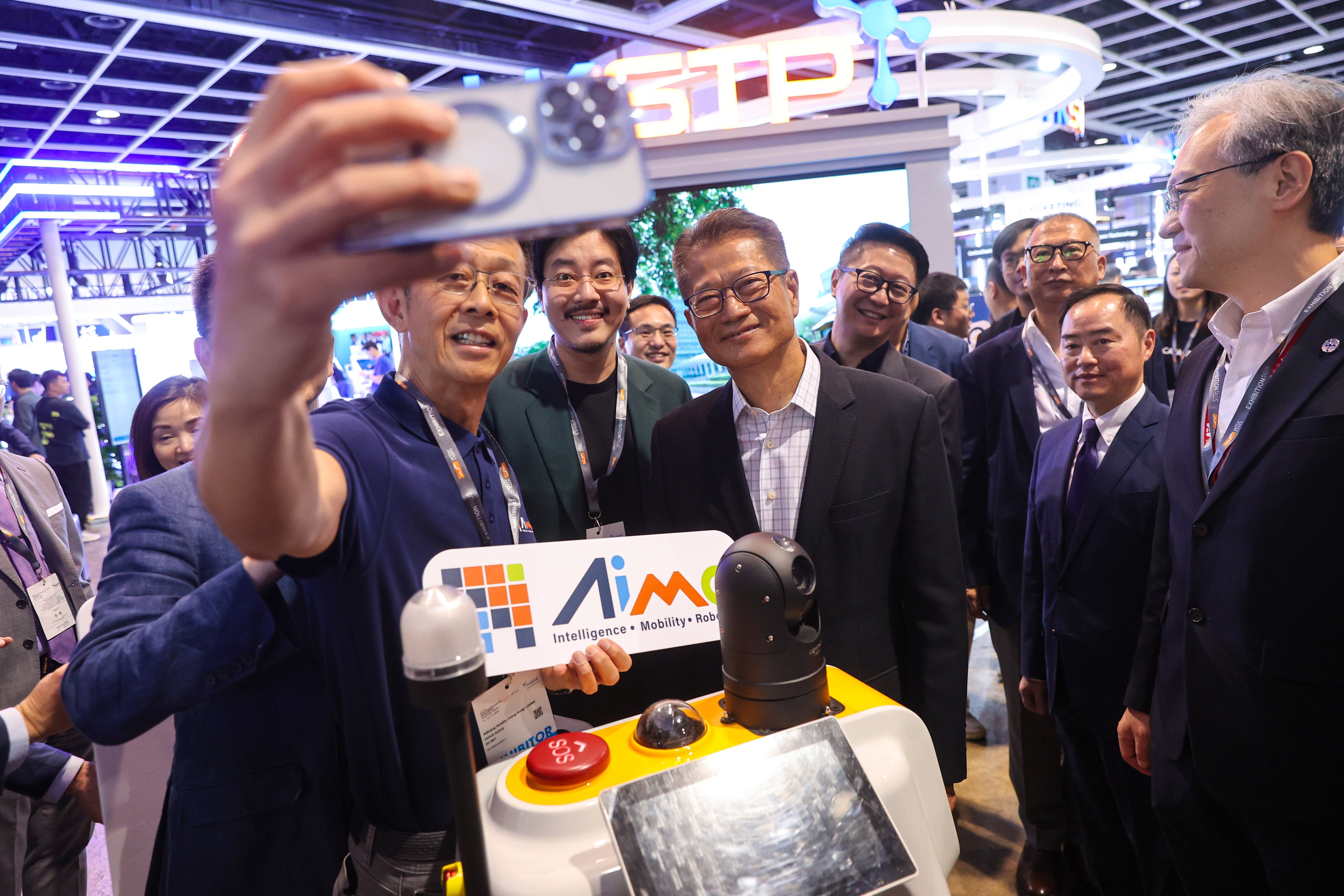 Finance chief Paul Chan poses for a photo at an exhibition earlier in the year. He says an efficient data ecosystem attracts businesses to the city. Photo: Edmond So