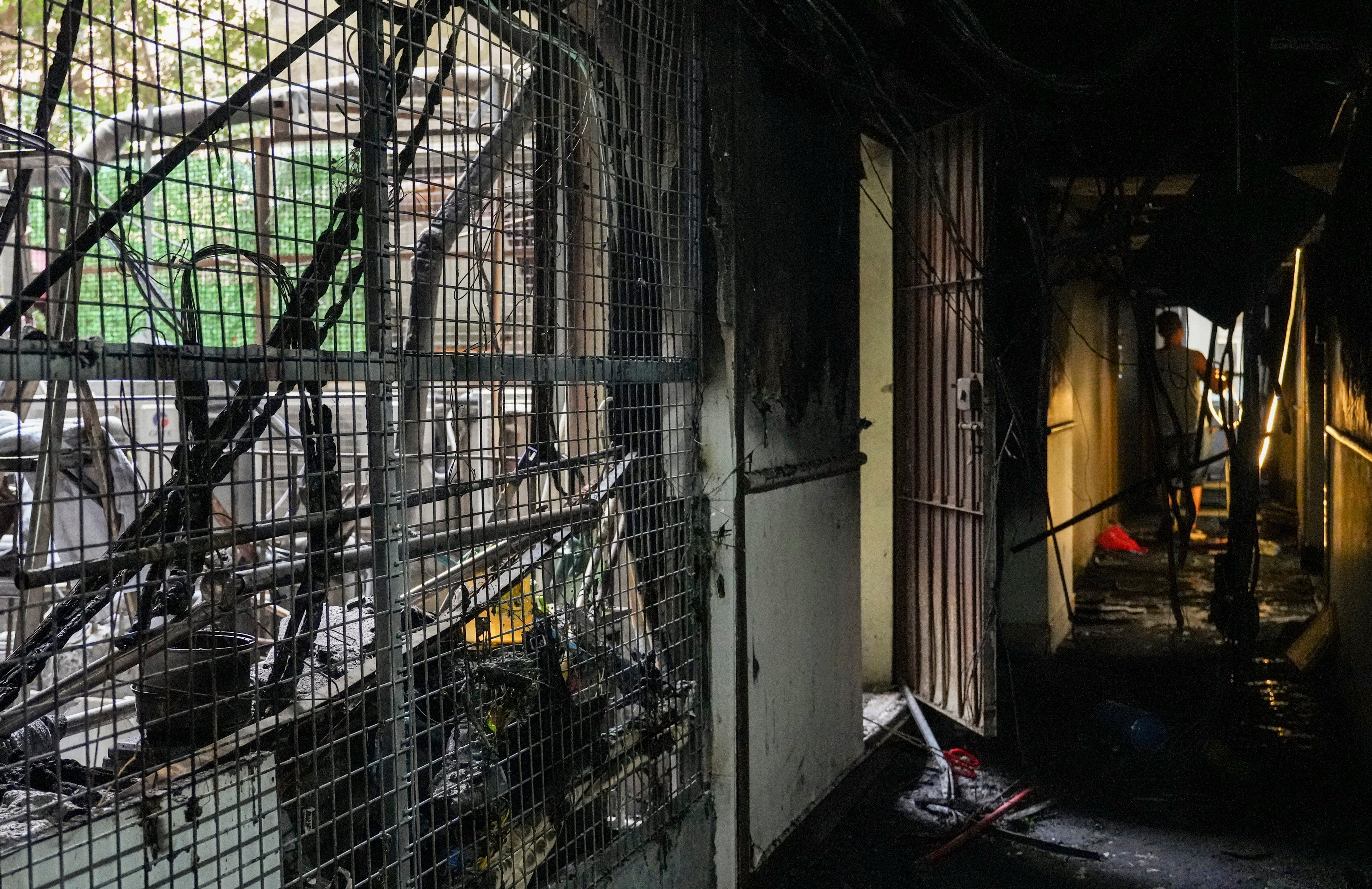 The corridors of New Lucky House are littered with debris. Photo: May Tse