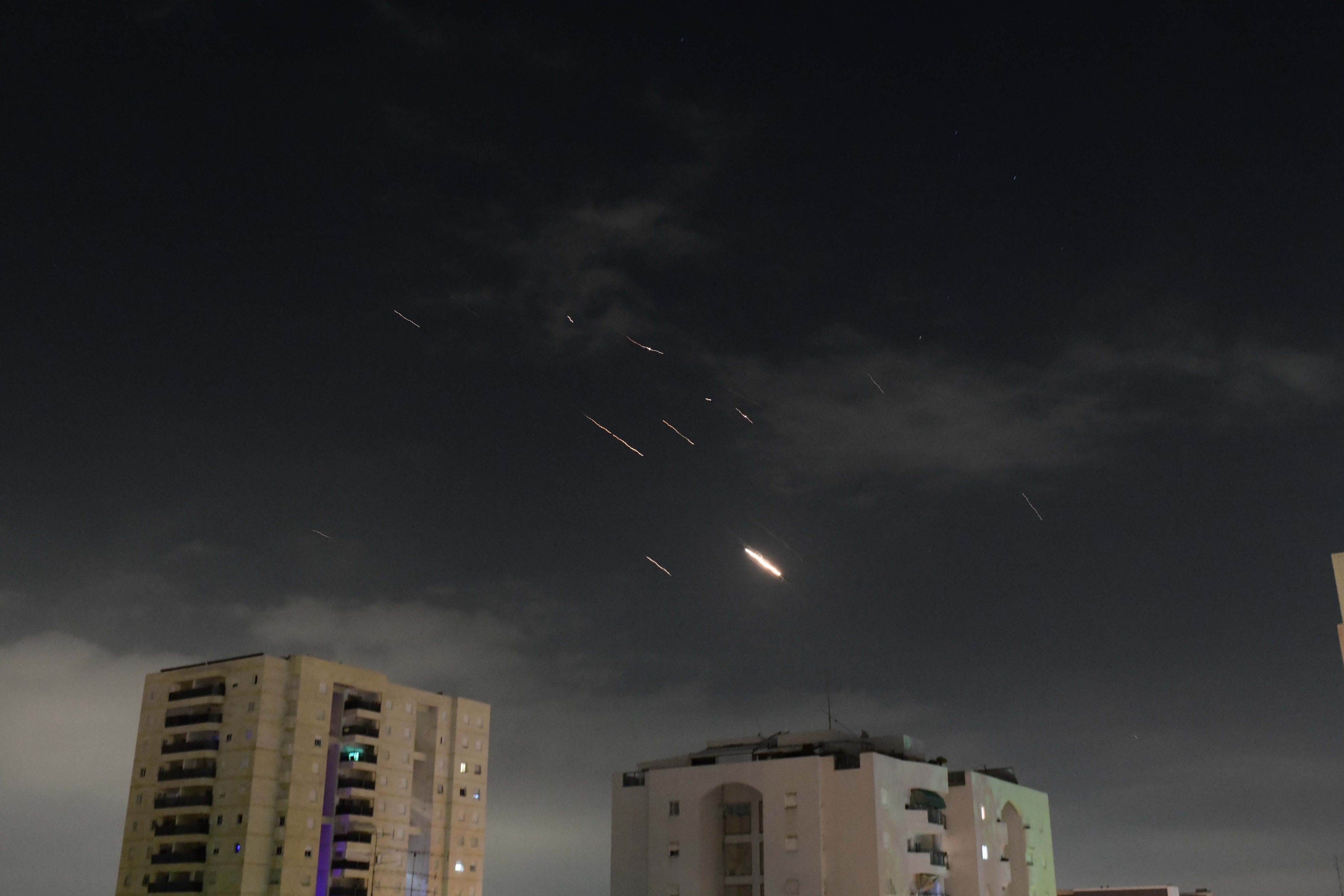 Flares from explosions in the sky over Tel Aviv as Israel’s anti-missile system intercepts missiles and drones from Iran. Photo: Tomer Neuberg/JINI via Xinhua 