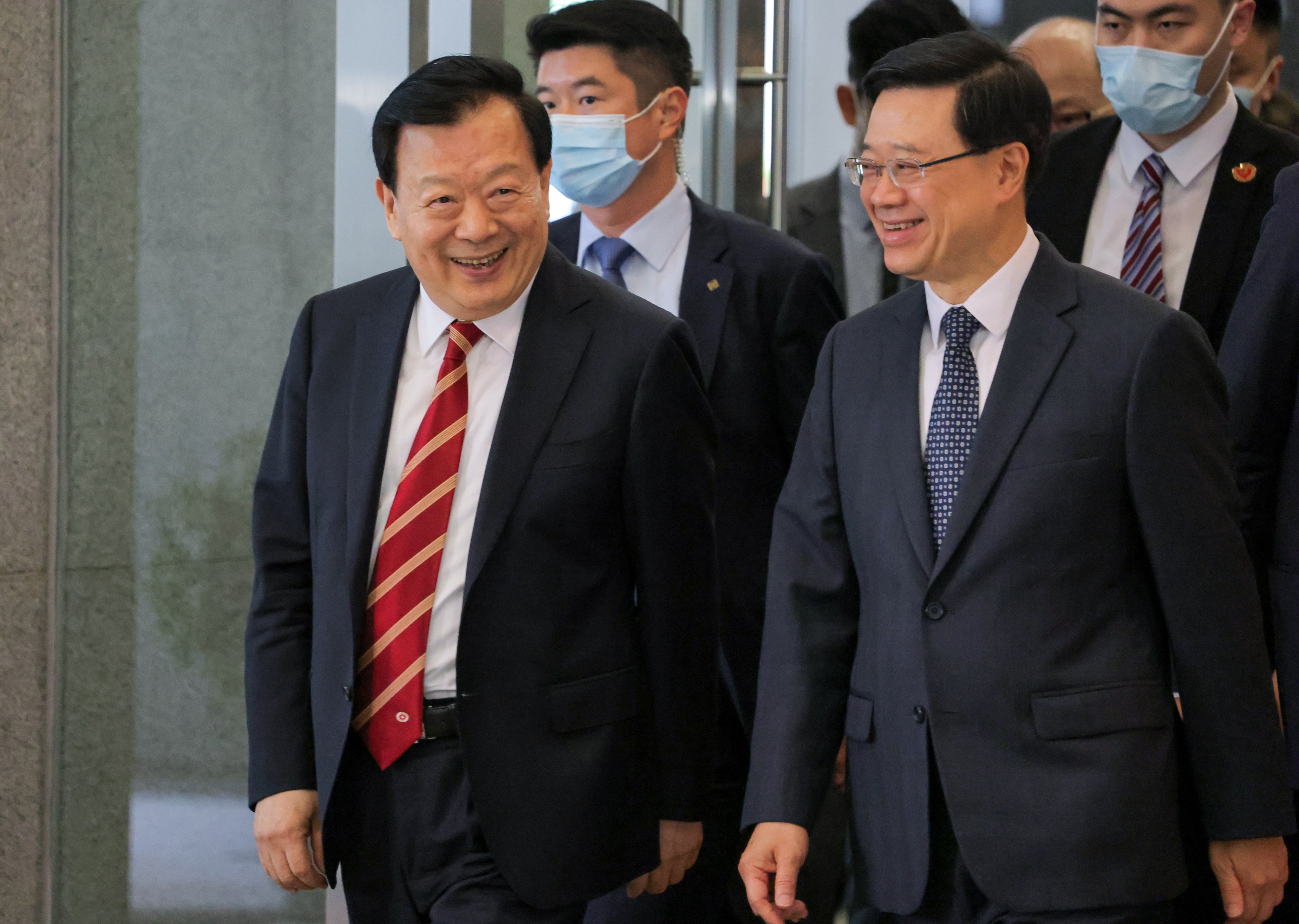 Hong Kong and Macau Affairs Office director Xia Baolong (left) and Chief Executive John Lee attending a meeting last year. Photo: Jelly Tse