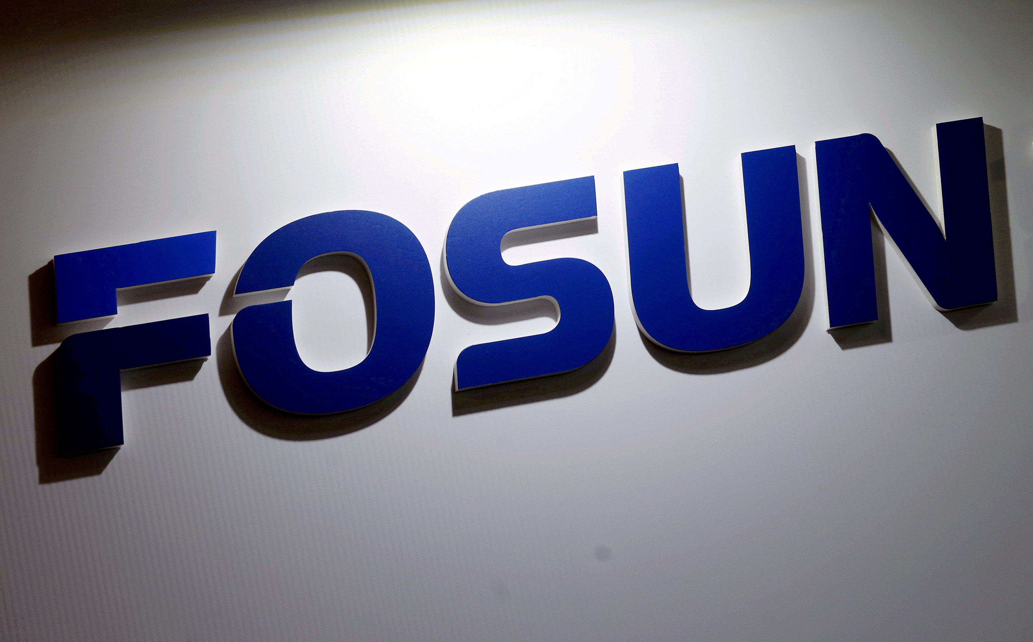 The logo of Fosun International is seen at a trade fair in Hong Kong in 2015. Photo: Reuters