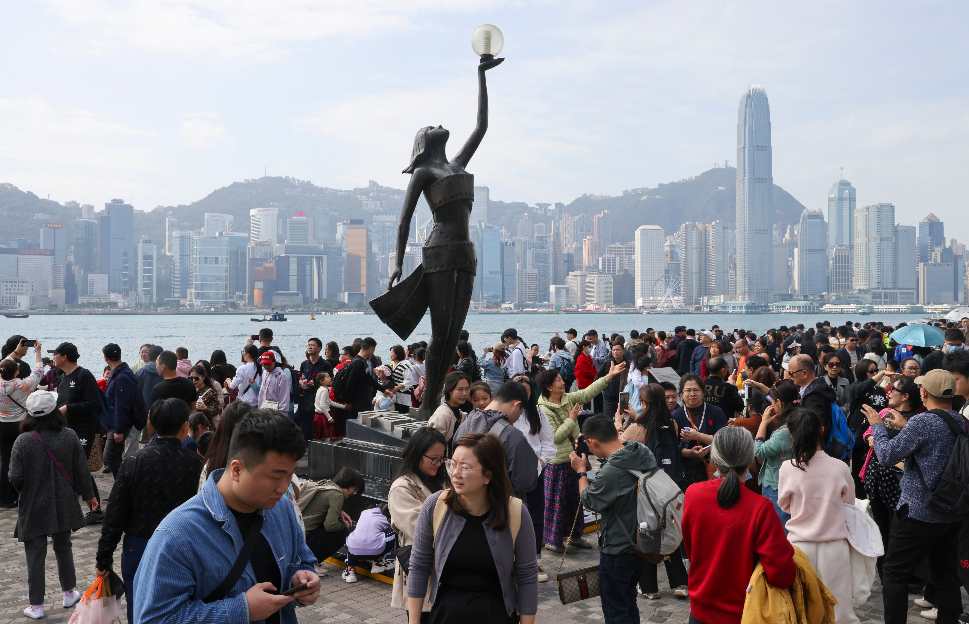 Tourists flock to in Tsim Sha Tsui. Hong Kong welcomed 723,587 visitors during the five-day break last year, 86 per cent of whom were mainlanders. Photo: Yik Yeung-man