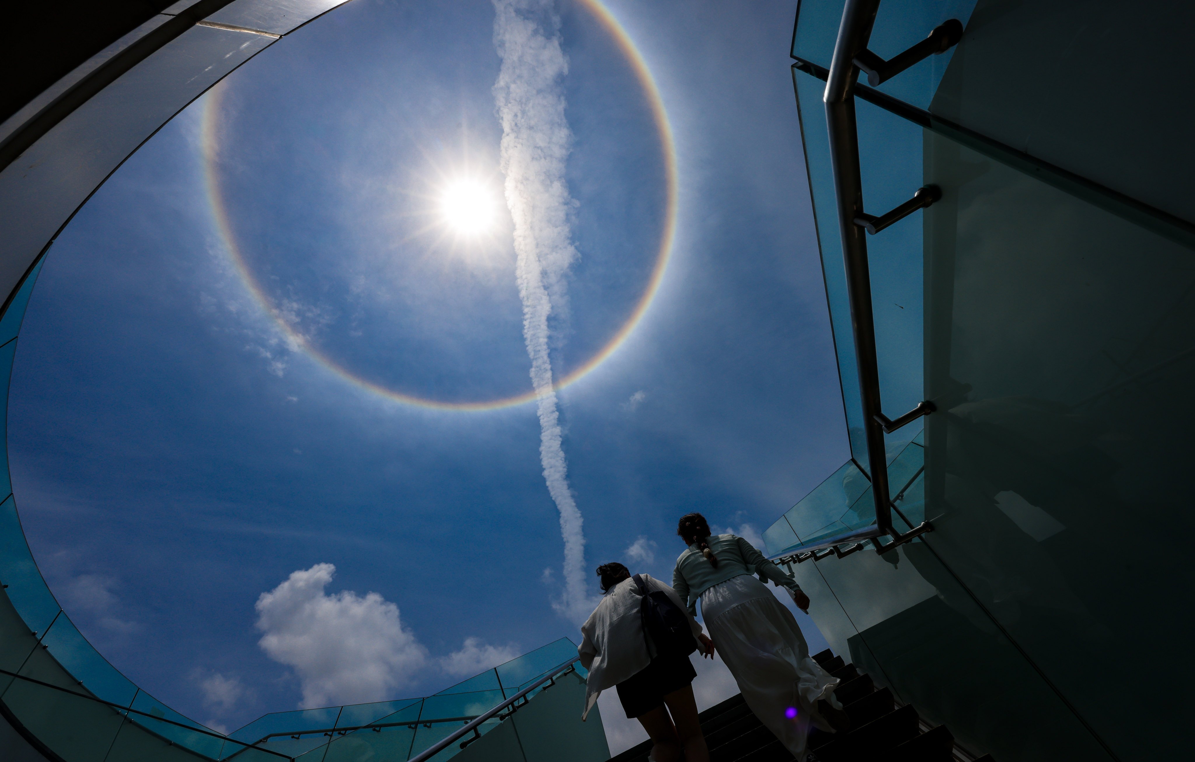 A halo formed by sunlight hitting ice crystals is seen over Hong Kong at Tsim Sha Tsui. Photo: Jelly Tse