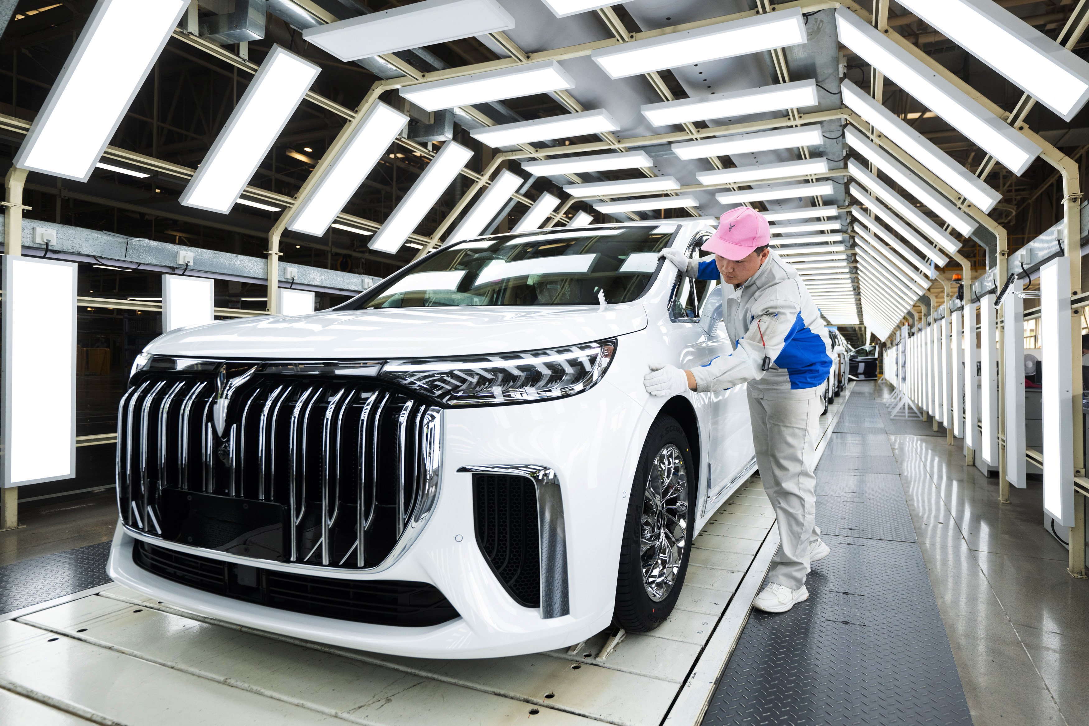 An employee works on an assembly line for Dongfeng Motor’s Voyah electric cars. Photo: Xinhua