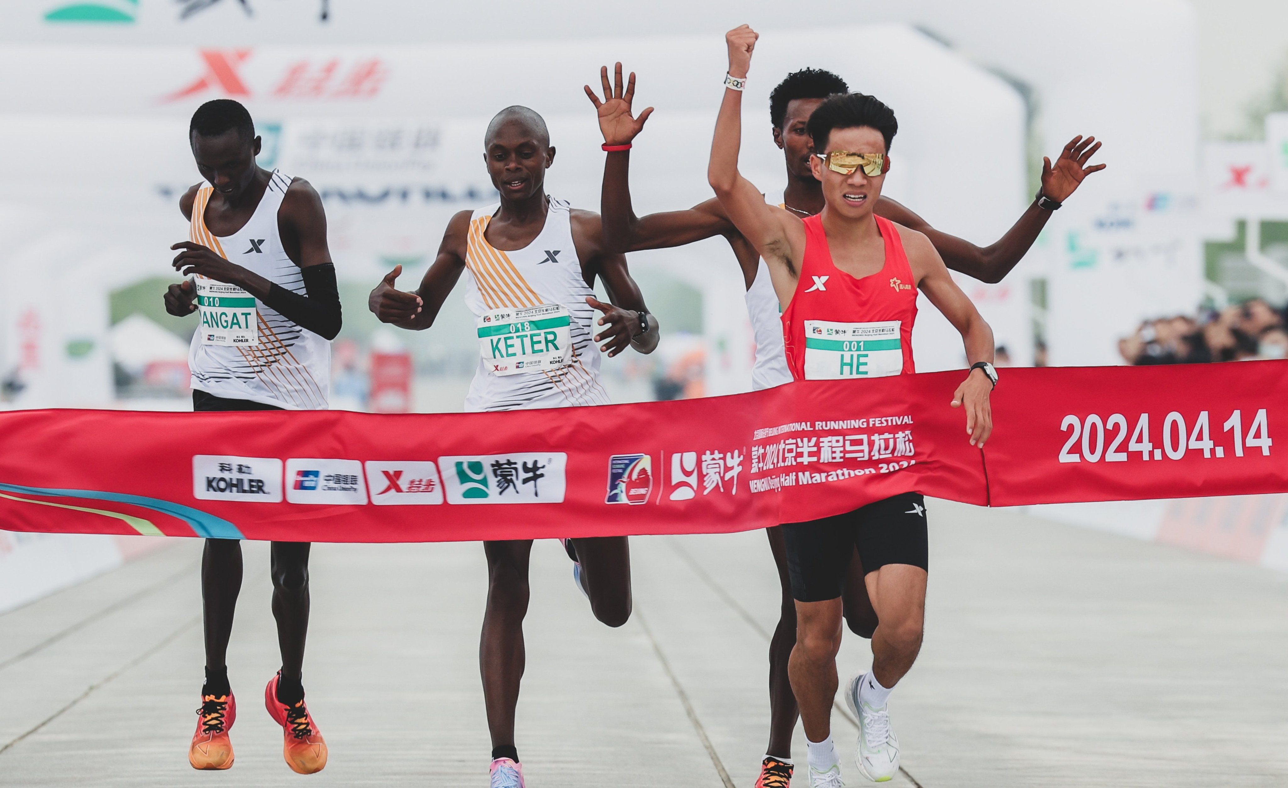 China’s He Jie winning the Beijing Half Marathon on Sunday ahead of Kenyans Willy Mnangat and Robert Keter, and Ethiopia’s Dejene Hailu Bikila. Photo: Handout