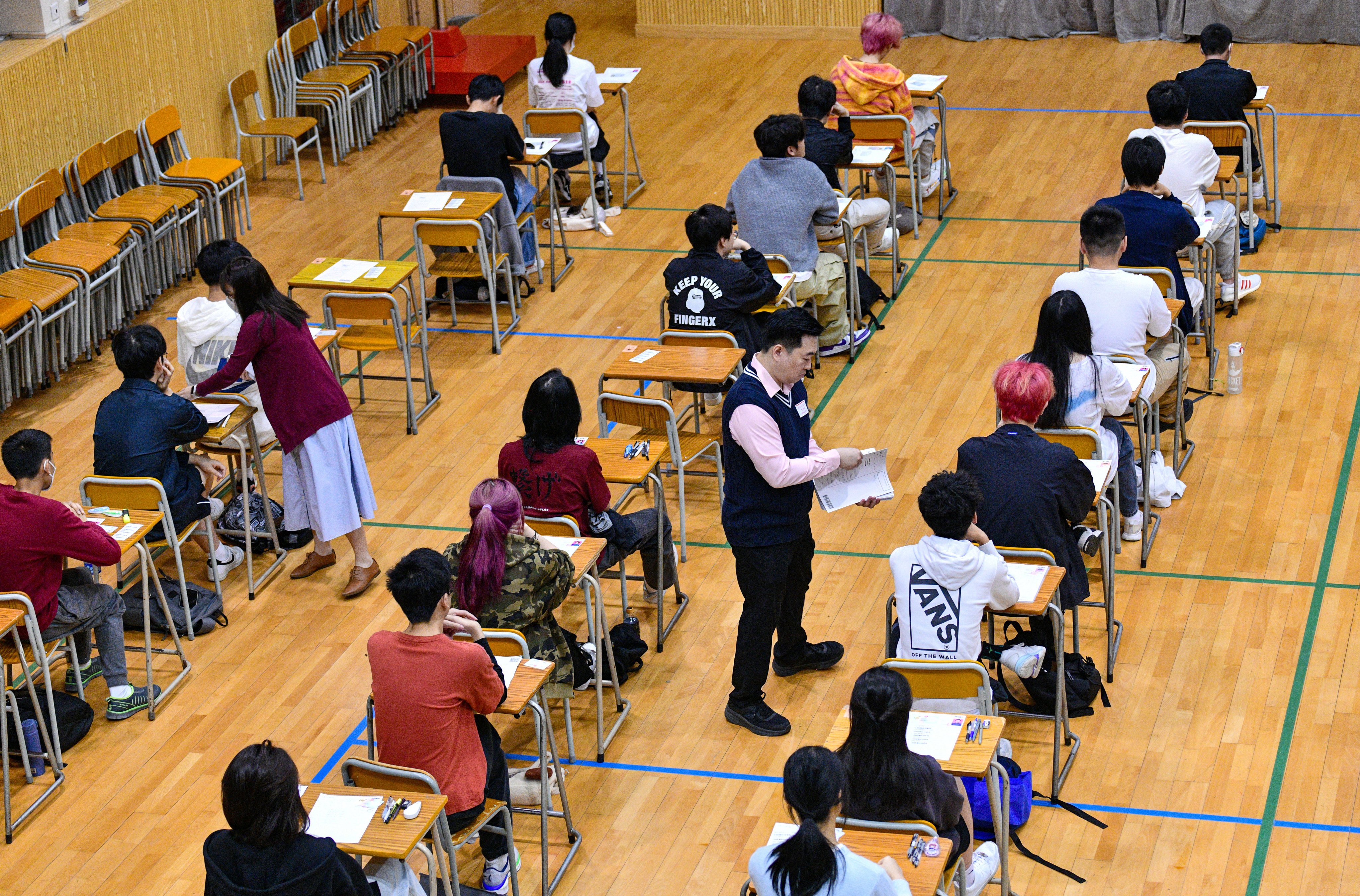 More than 45,000 Hong Kong students sat for the inaugural university entrance exam for citizenship and social development. Photo: Handout
