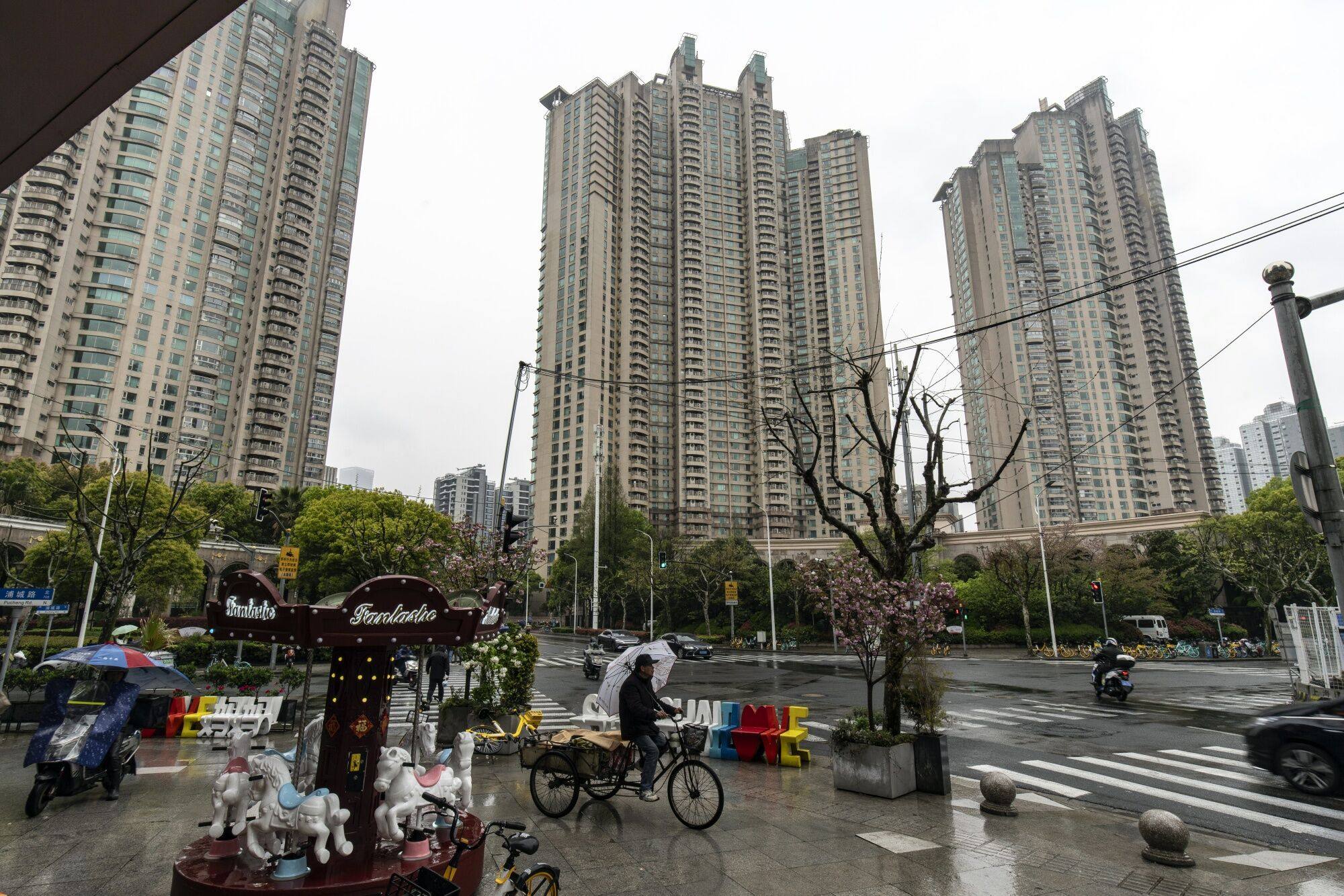 Residential buildings in Shanghai on April 8, 2024. Weak home sales are compounding the debt crisis among Chinese developers. Photo: Bloomberg