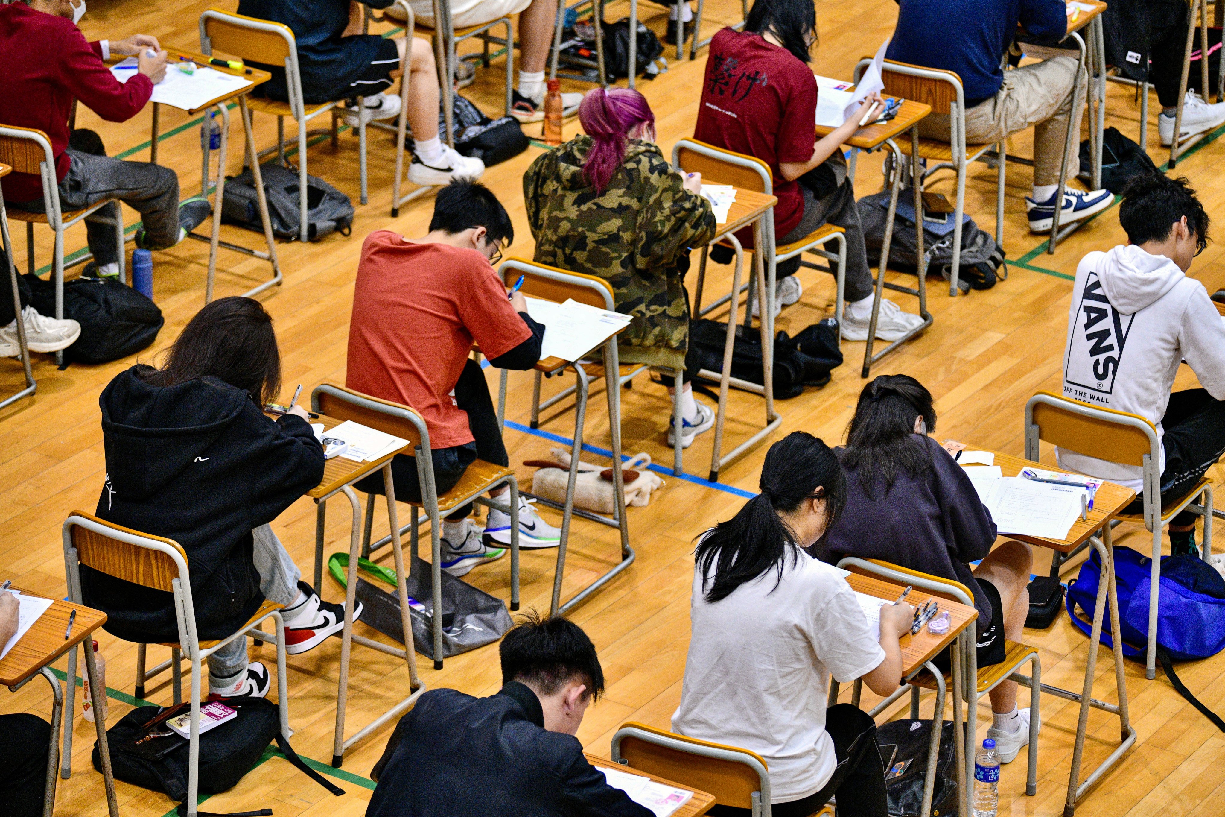 A test under way at a school in Tai Po. Examination personnel are prohibited from reproducing or publishing related content without approval. Photo: Handout