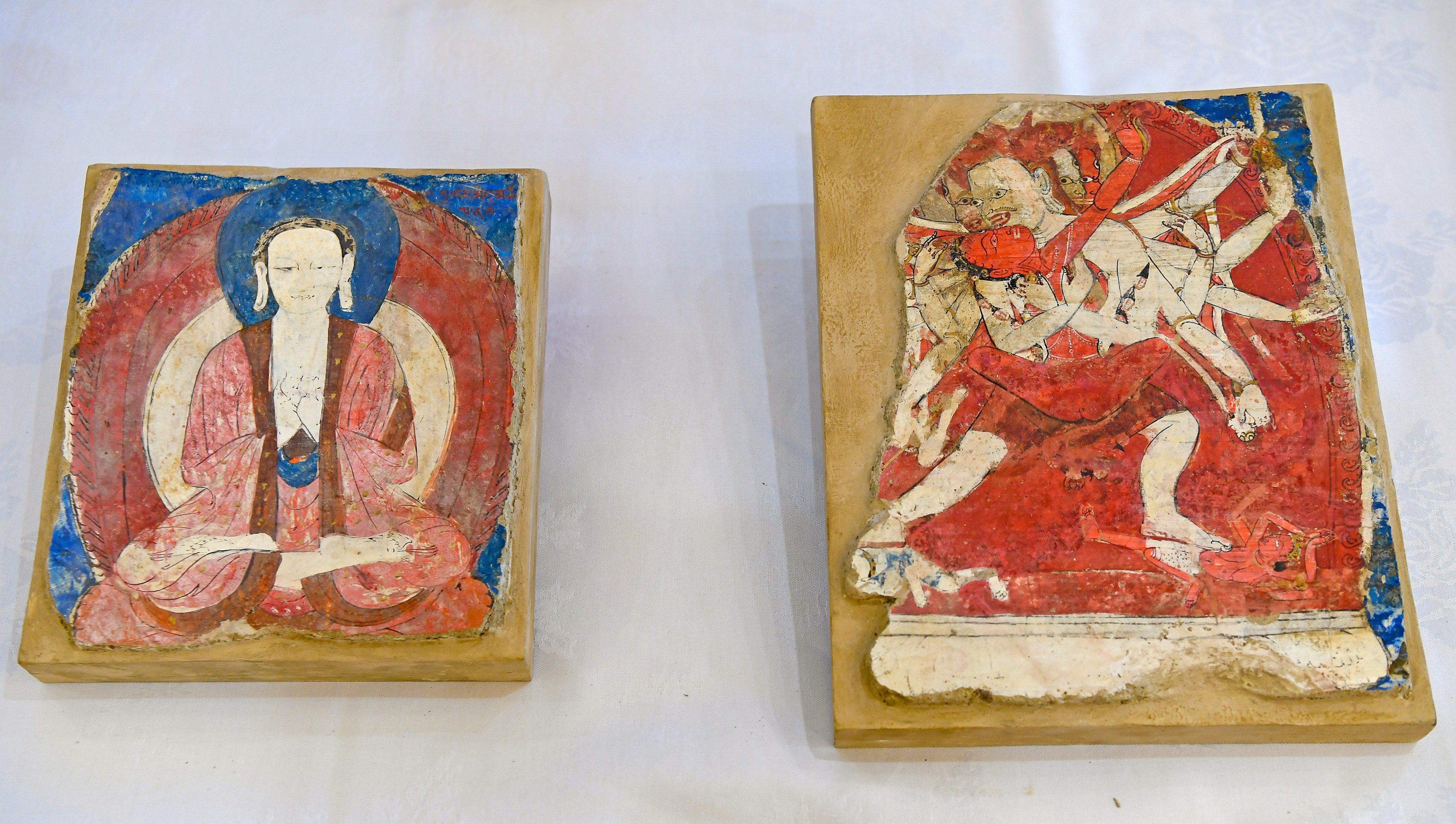 A group of 38 Chinese artefacts, including these highly decorative mural fragments, have been returned to China by the US under a repatriation agreement. Photo: Xinhua