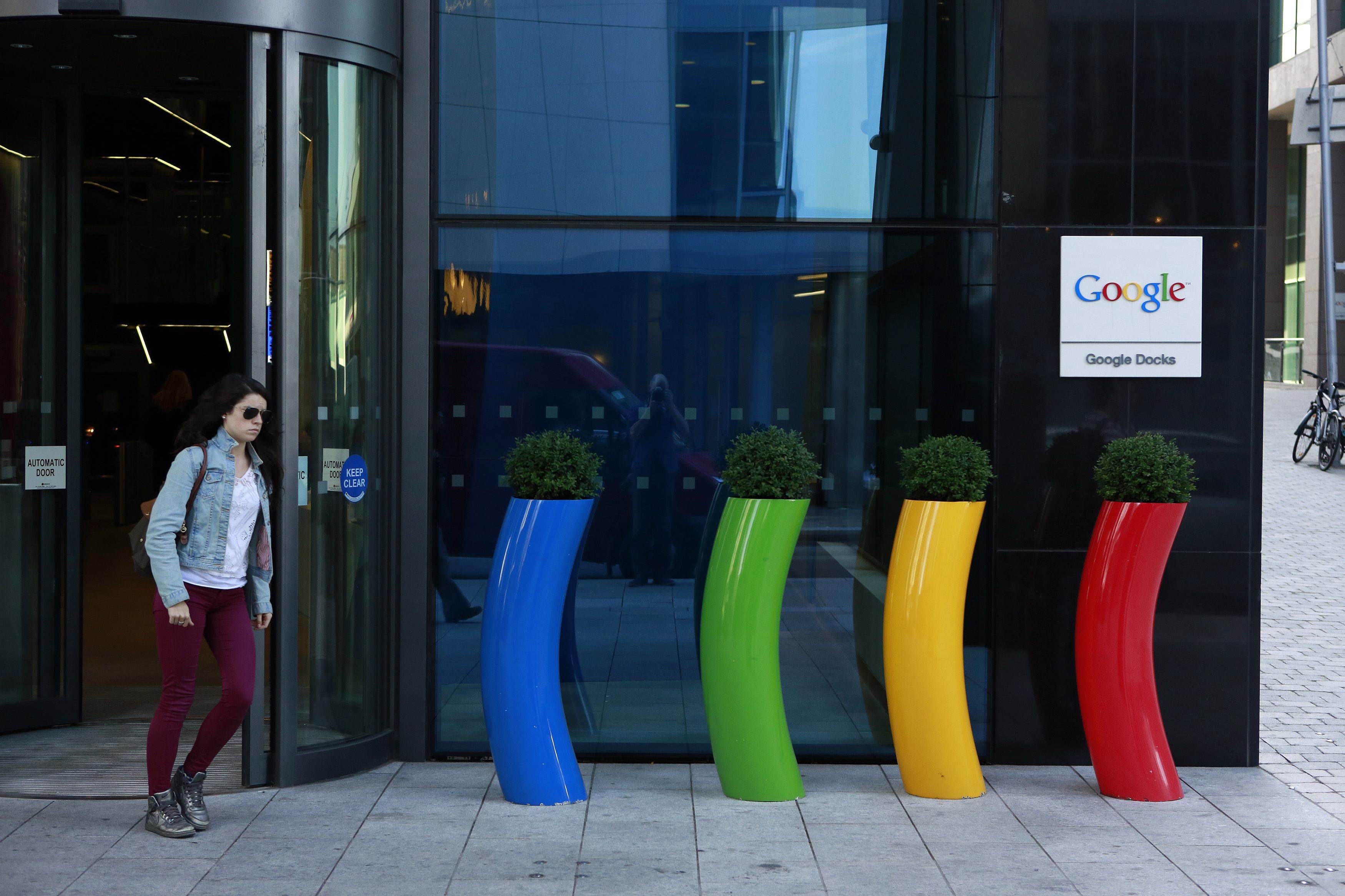 A woman walks past the Google offices near the city centre in Dublin on July 8, 2013. Photo: Reuters