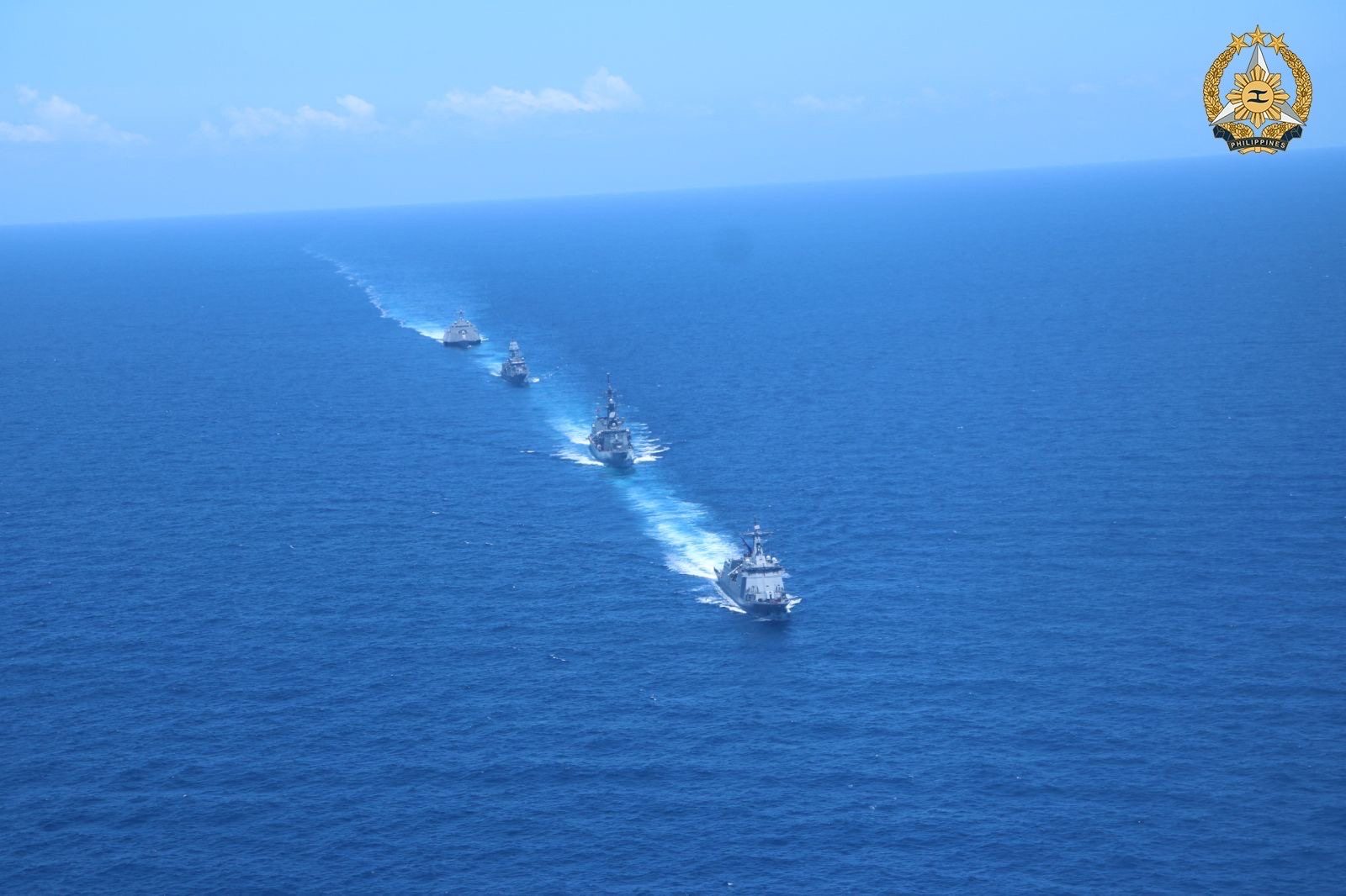 A Philippine Navy frigate leads three other participating ships during the first “multilateral maritime cooperative activity” with the US, Australia and Japan in the South China Sea. Photo: AFP/Armed Forces of the Philippines  