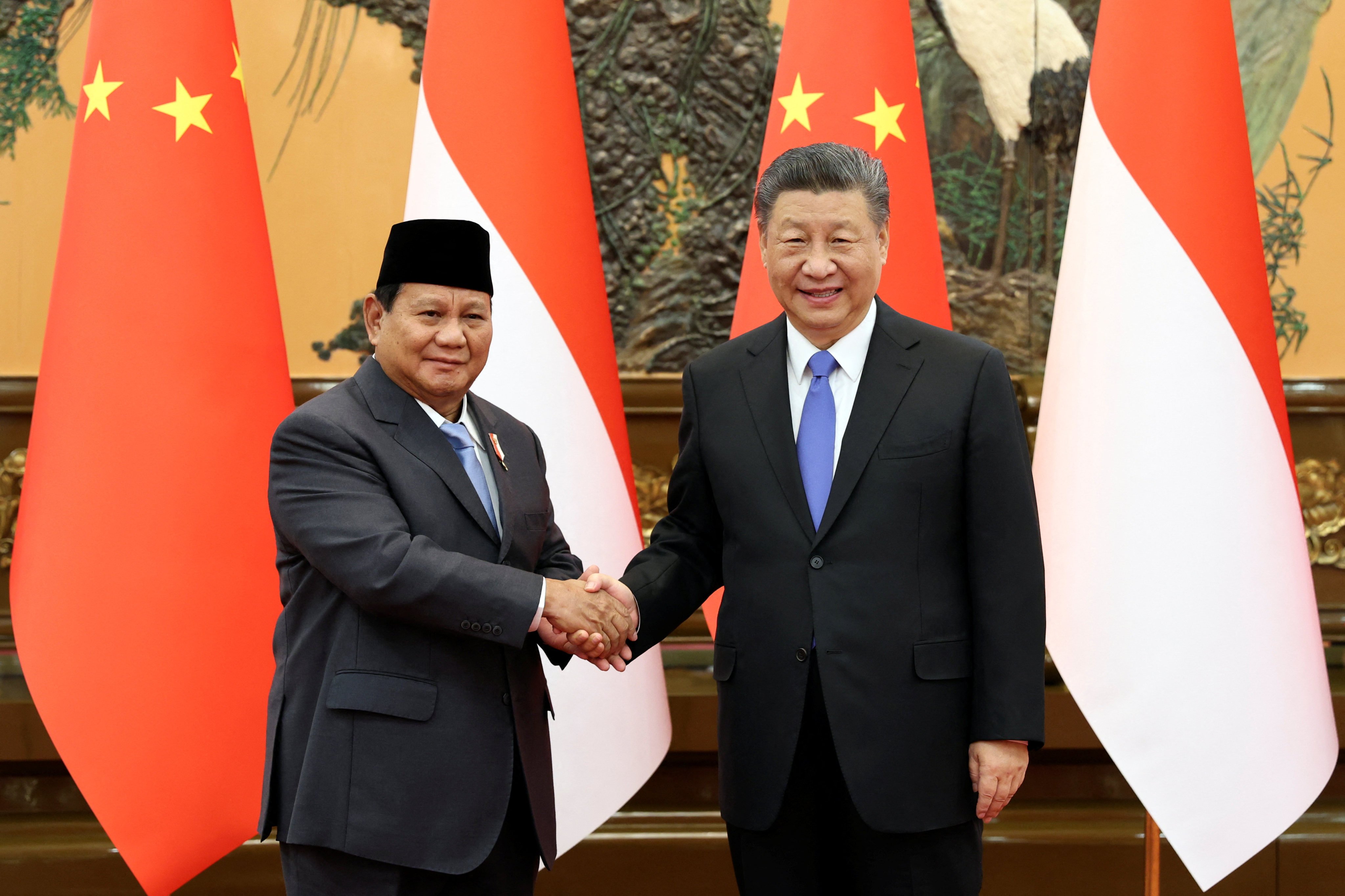 Chinese President Xi Jinping and Indonesia’s President-elect Prabowo Subianto shake hands at the Great Hall of the People in Beijing, China, on April 1. Photo: China Daily via Reuters