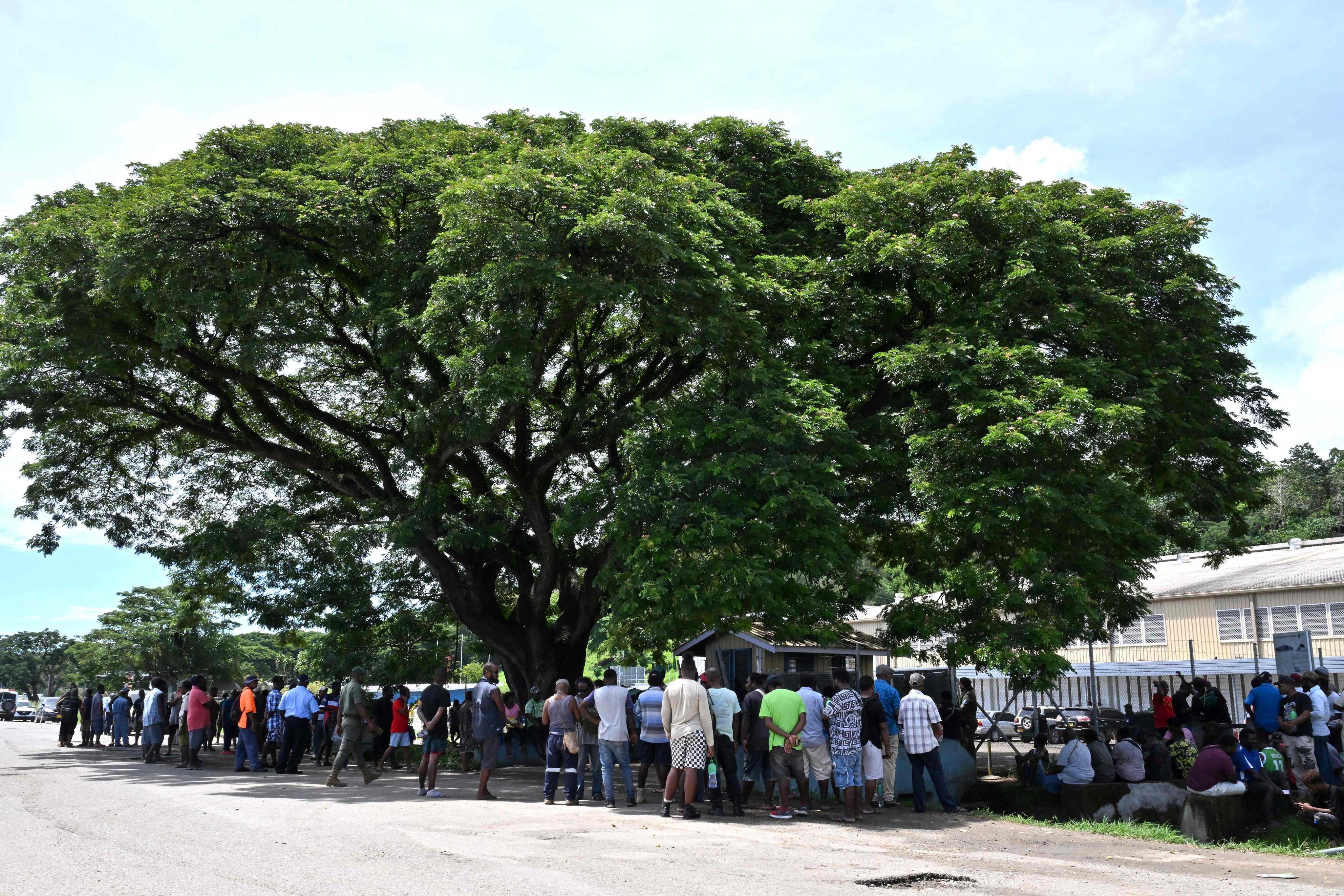People gather outside a vote counting centre in Honiara, Solomon Islands, on April 18. Photo: AFP