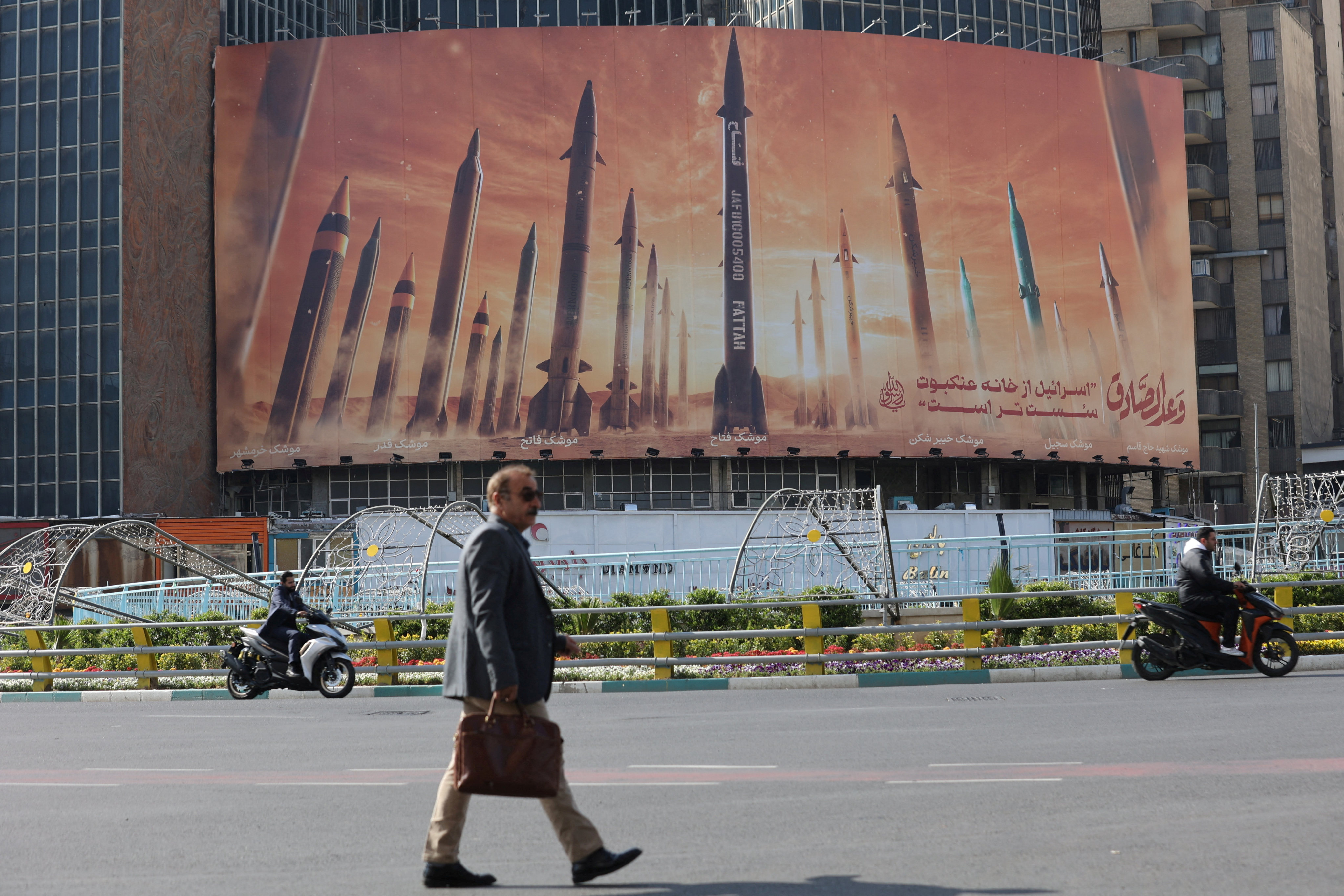 A billboard featuring missiles in Tehran. Iran shot down several drones over the central city of Isfahan early Friday. Photo: WANA via Reuters