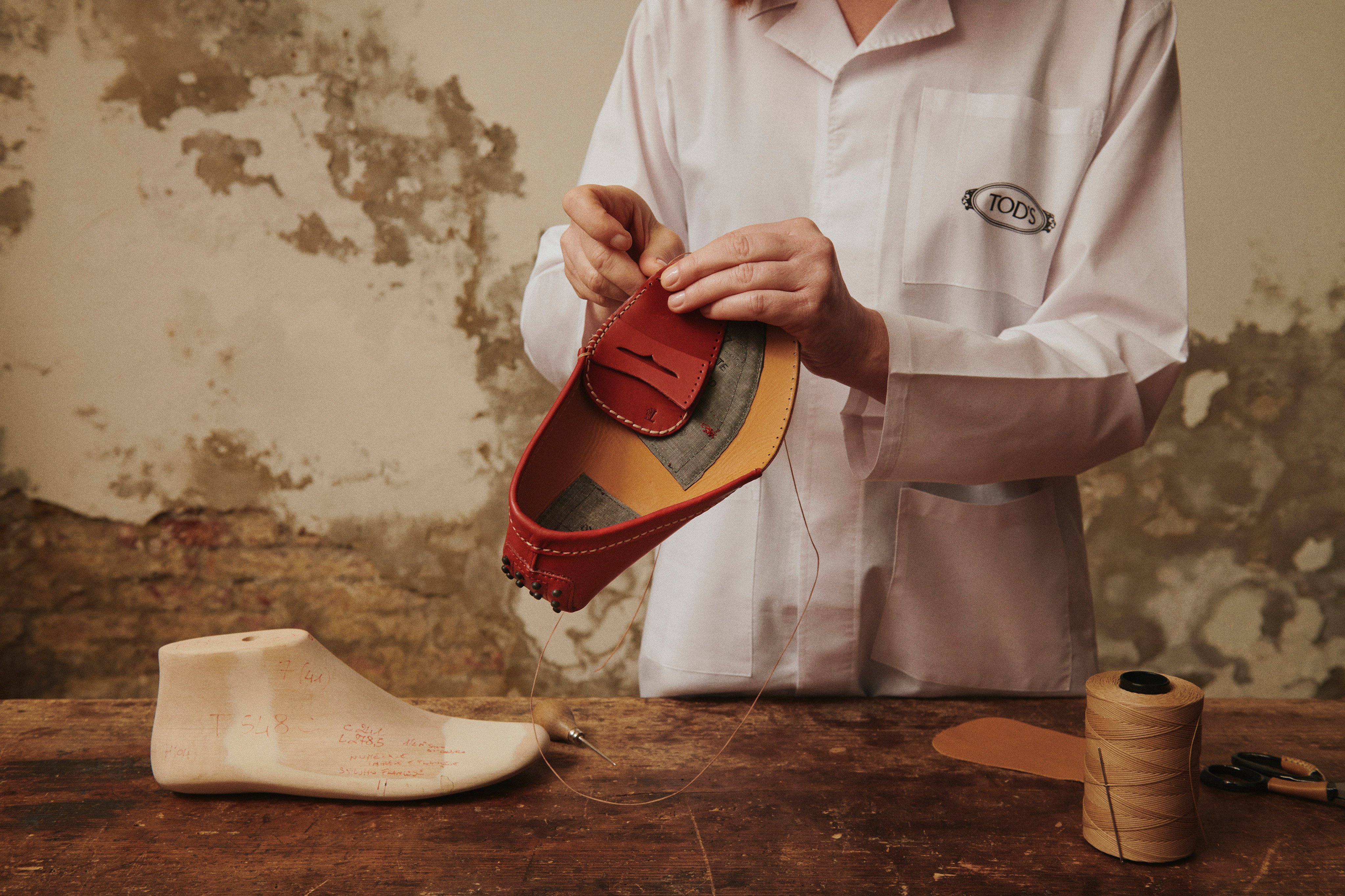 Tod’s latest exhibition showed its unwavering support for Italian artistry, featuring craftsmen including glass artists and gold-leaf beaters, and nodding to the brand’s iconic Gommino shoe. Photos: Handout