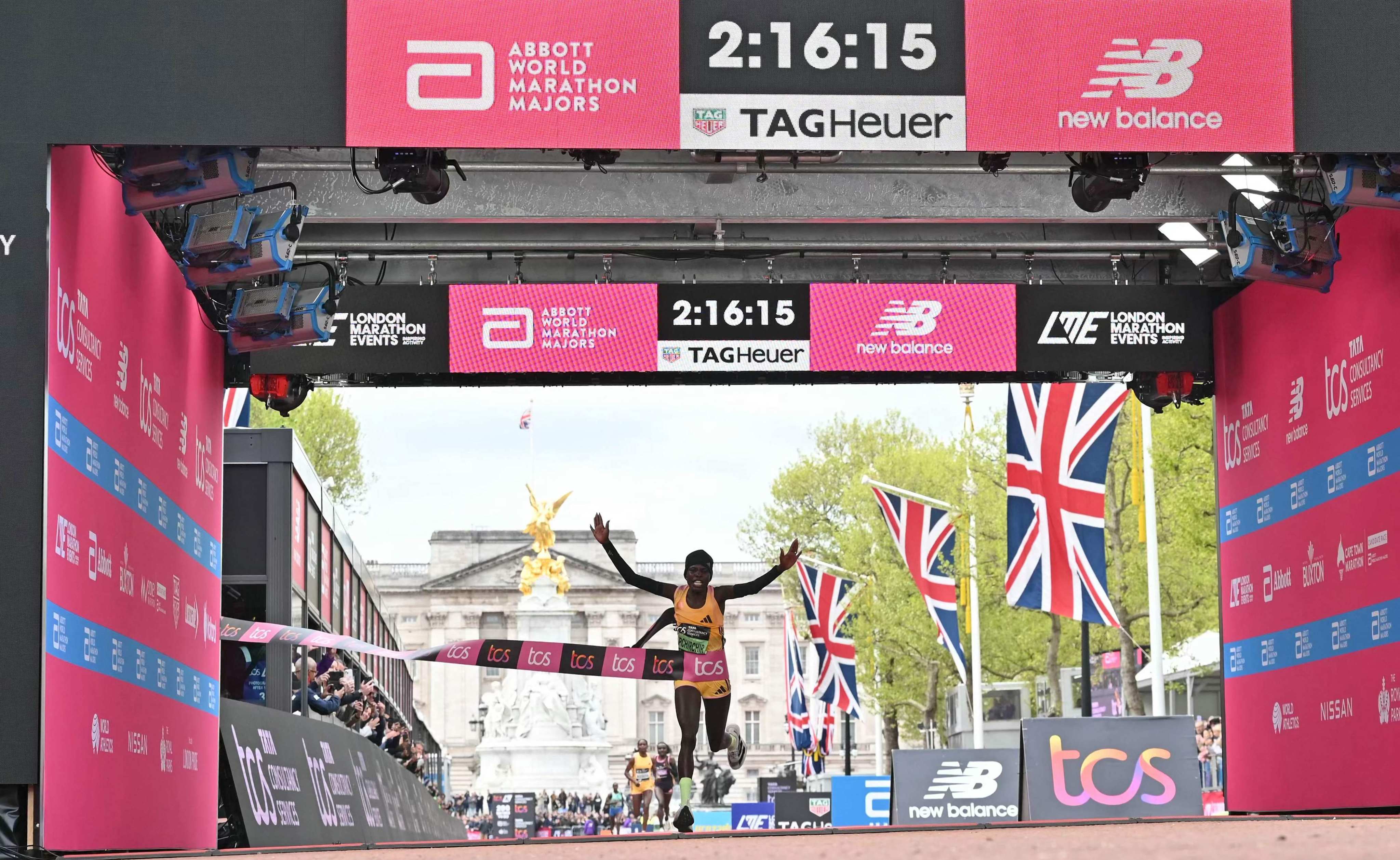 Kenya’s Peres Jepchirchir crosses the line to win the women’s race in a world record time. Photo: AFP