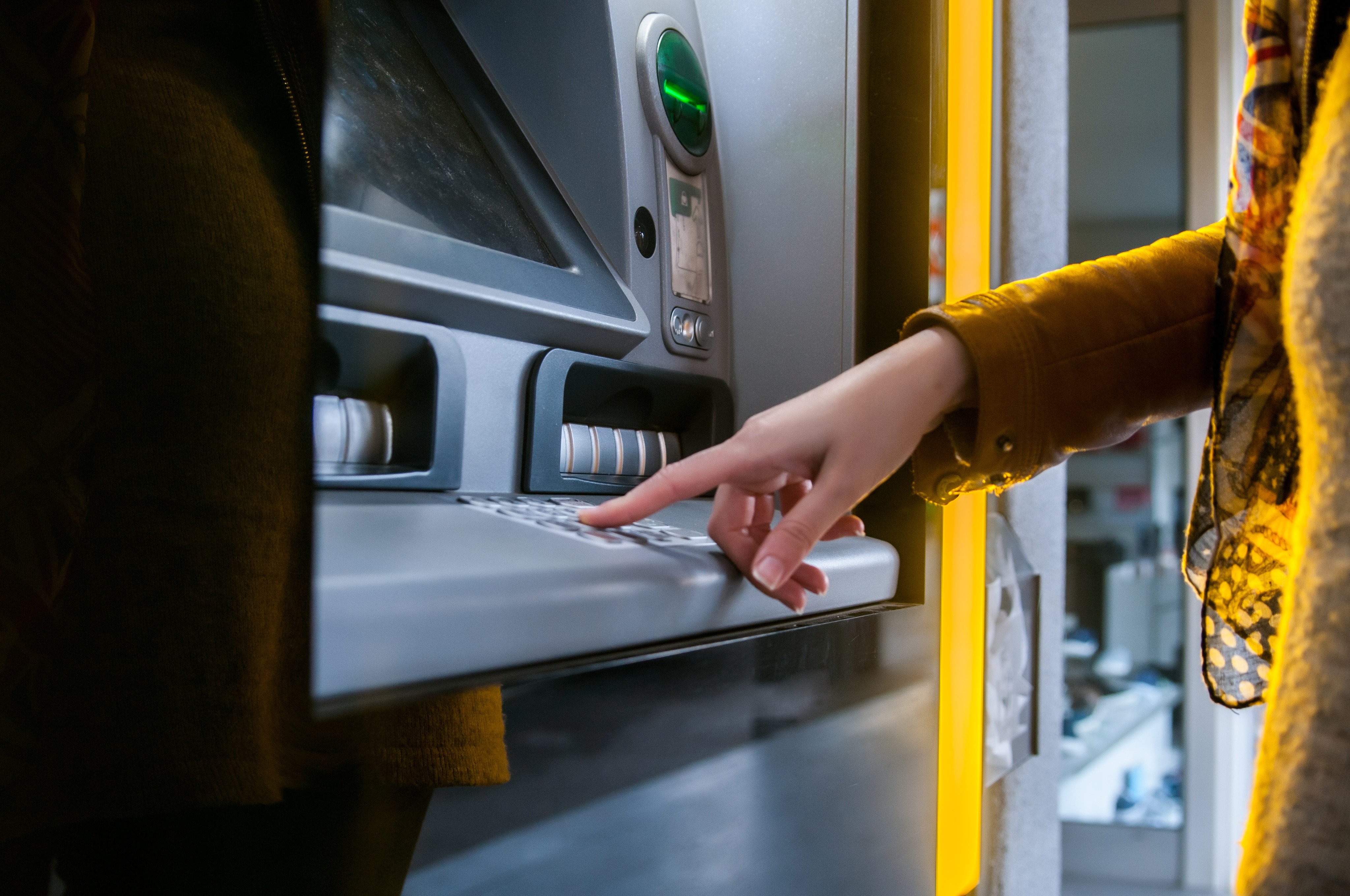 Police have arrested two men after they try to deposit bounced cheques through an ATM as part of a HK$1.5 million scam. Photo: Shutterstock