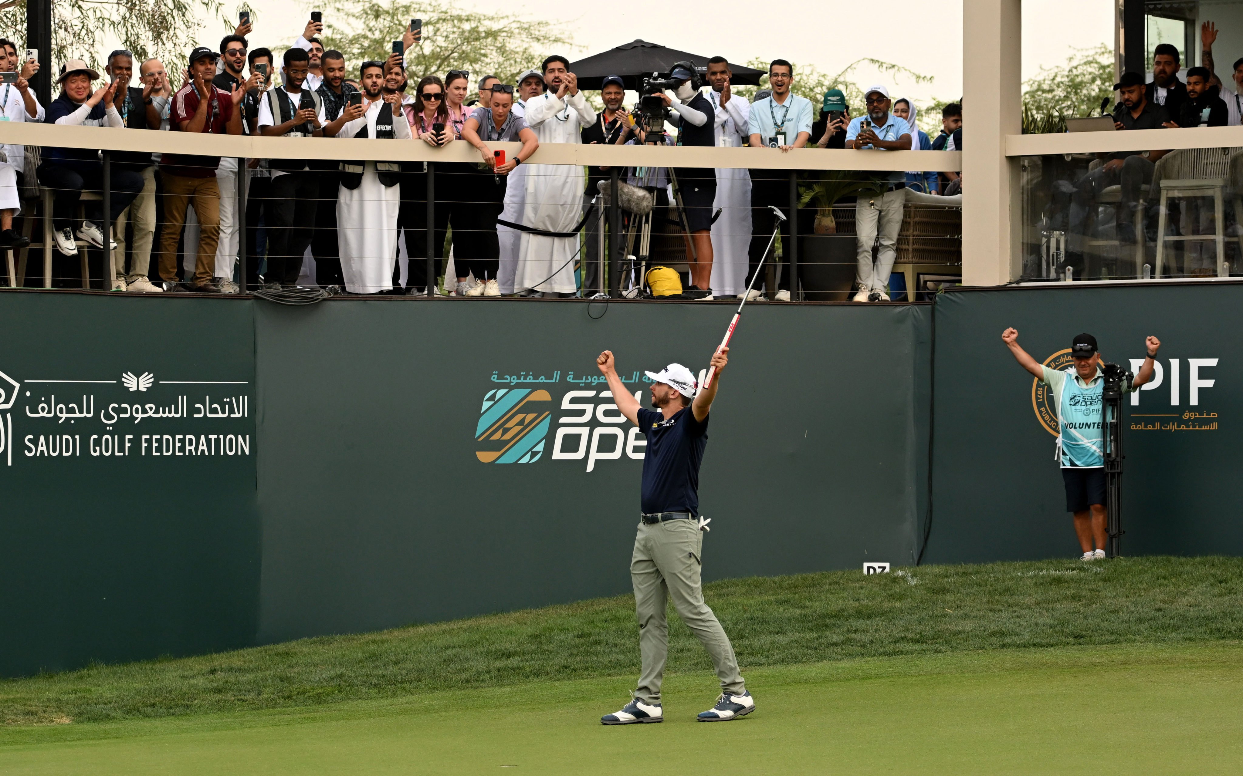 John Catlin celebrates on the 18th green after winning the Saudi Open at Riyadh Golf Club. Photo: Asian Tour.